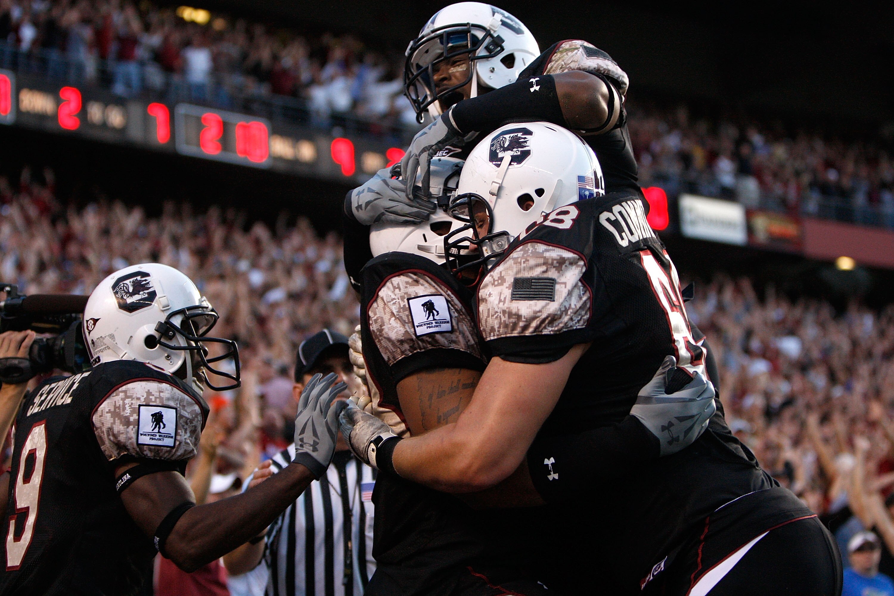 COLUMBIA, SC - NOVEMBER 14:  Weslye Saunders #88 of the South Carolina Gamecocks celebrates with teammates after catching a touchdown against the Florida Gators during their game at Williams-Brice Stadium on November 14, 2009 in Columbia, South Carolina.