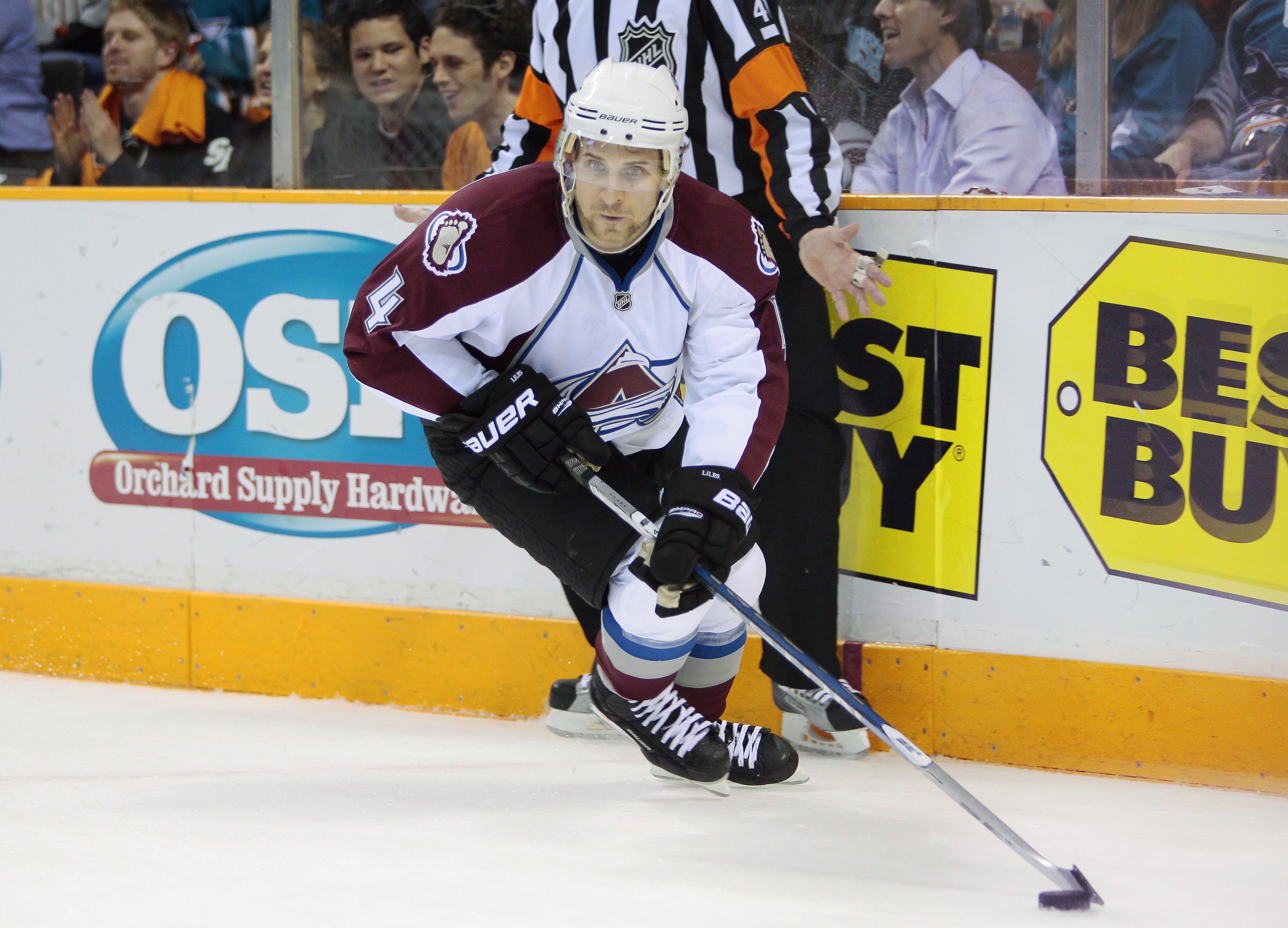SAN JOSE, CA - APRIL 22:  John-Michael Liles #4 of the Colorado Avalanche takes the puck from out behind the goal against the San Jose Sharks in Game Five of their Western Conference Quaterfinals during the 2010 Stanley Cup Playoffs at HP Pavilion on Apri