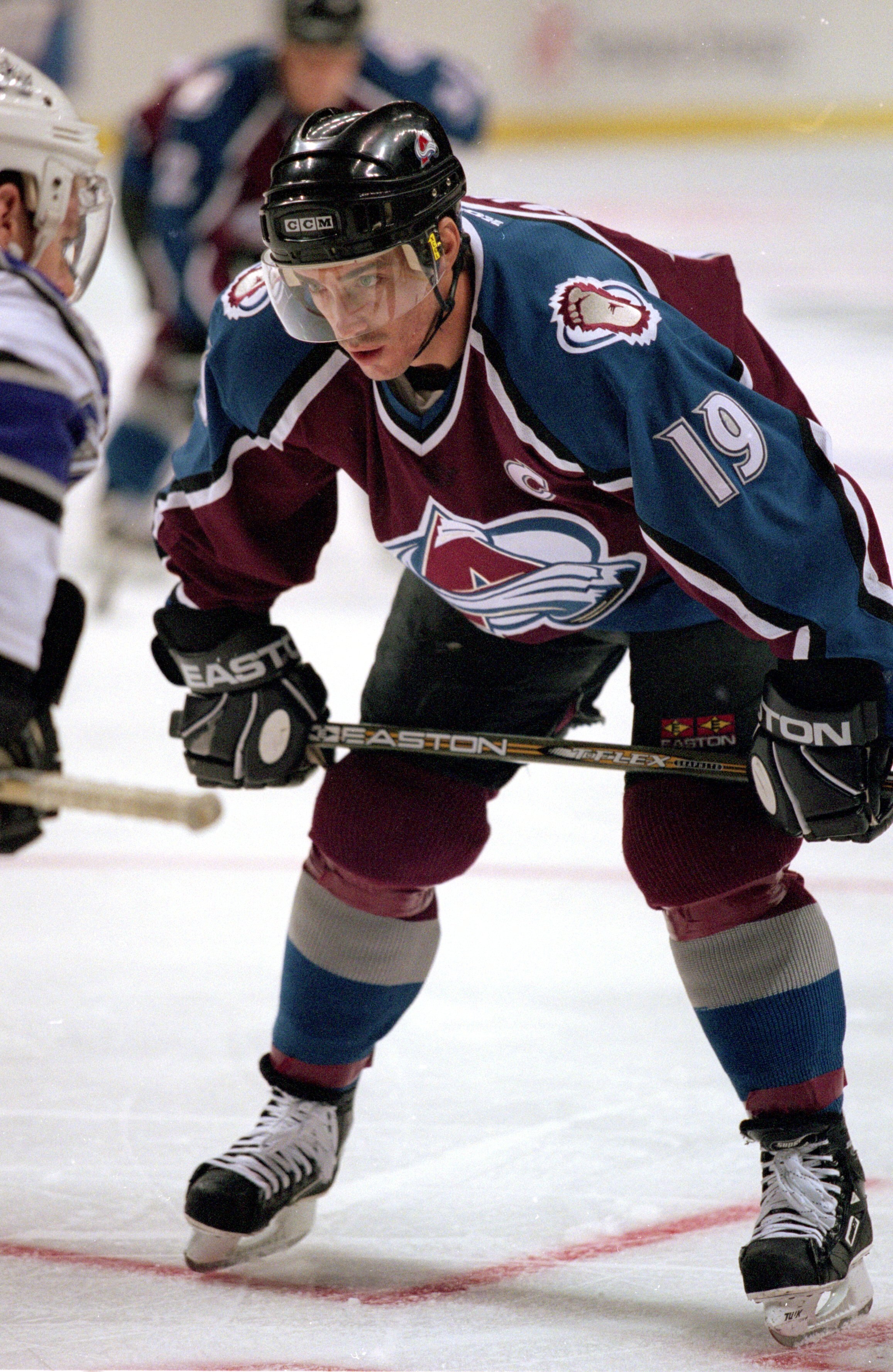 30 Sep 2000: Joe Sakic #19 of the Colorado Avalanche waits on the ice during the game against the Los Angeles Kings at the MGM Grand Garden Arena in Las Vegas, Nevada. The Avalanche defeated the Kings 5-4.Mandatory Credit: Kellie Landis  /Allsport