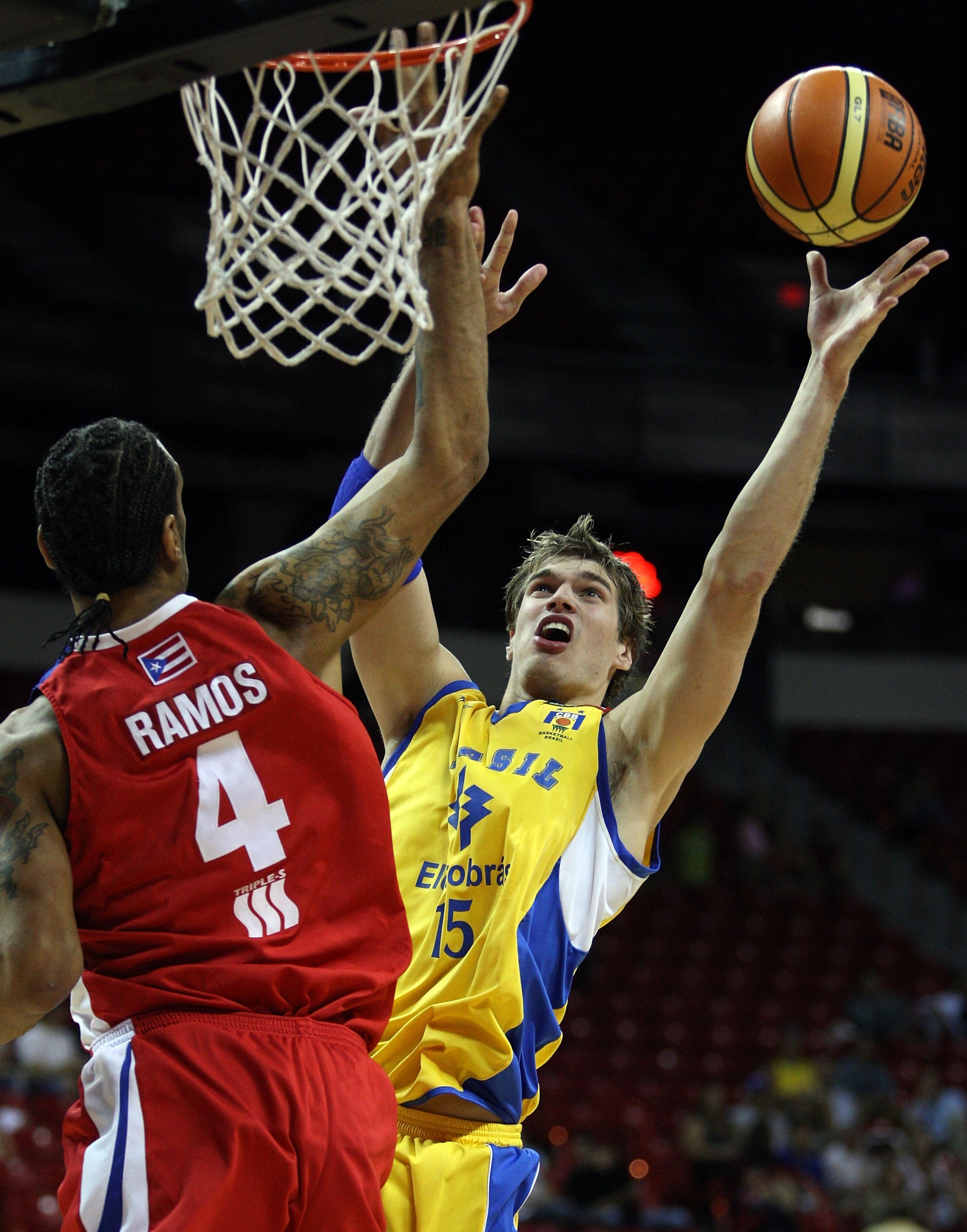 LAS VEGAS - SEPTEMBER 2: Tiago Splitter #15 of Brazil shoots over Peter J. Ramos #4 of Puerto Rico during the FIBA Americas Championship 2007 Bronze Medal game at Thomas & Mack Center September 2, 2007 in Las Vegas, Nevada. (Photo by Jamie Squire/Getty LAS VEGAS - SEPTEMBER 2: Tiago Splitter #15 of Brazil shoots over Peter J. Ramos #4 of Puerto Rico during the FIBA Americas Championship 2007 Bronze Medal game at Thomas & Mack Center September 2, 2007 in Las Vegas, Nevada. (Photo by Jamie Squire/Getty