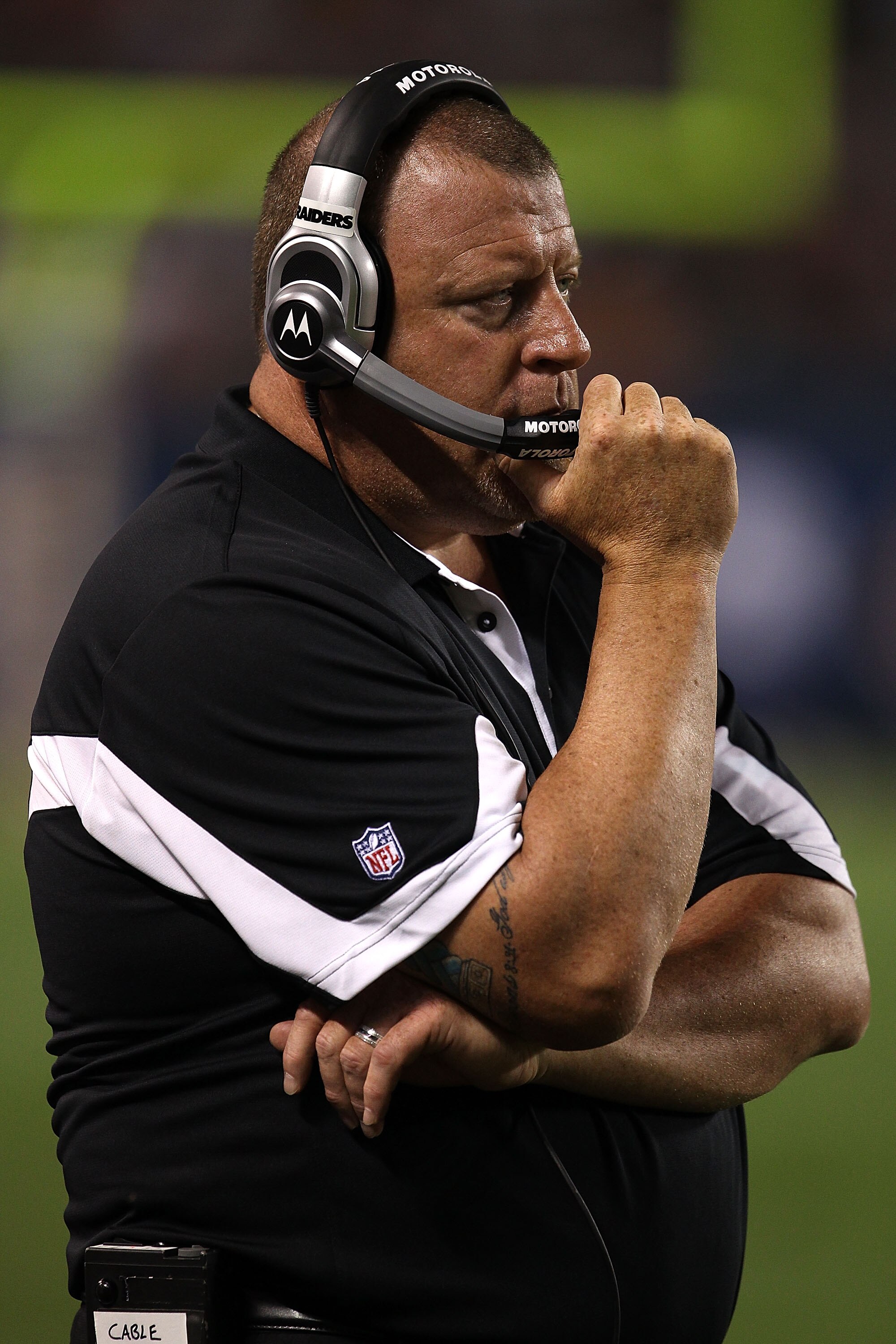 CHICAGO - AUGUST 21: Head coach Tom Cable of the Oakland Raiders watches as his team takes on the Chicago Bears during a preseason game at Soldier Field on August 21, 2010 in Chicago, Illinois. The Raiders defeated the Bears 32-17. (Photo by Jonathan Dani CHICAGO - AUGUST 21: Head coach Tom Cable of the Oakland Raiders watches as his team takes on the Chicago Bears during a preseason game at Soldier Field on August 21, 2010 in Chicago, Illinois. The Raiders defeated the Bears 32-17. (Photo by Jonathan Dani