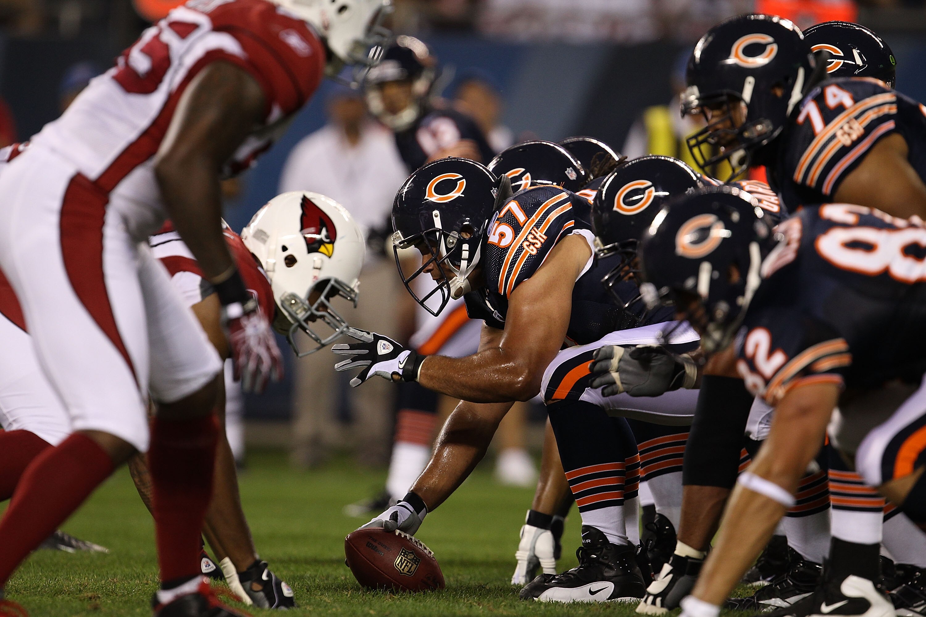 CHICAGO - AUGUST 28: Olin Kreutz #57 of the Chicago Bears waits to snap the ball against the Arizona Cardinals during a preseason game at Soldier Field on August 28, 2010 in Chicago, Illinois. The Cardinals defeated the Bears 14-9. (Photo by Jonathan Dani CHICAGO - AUGUST 28: Olin Kreutz #57 of the Chicago Bears waits to snap the ball against the Arizona Cardinals during a preseason game at Soldier Field on August 28, 2010 in Chicago, Illinois. The Cardinals defeated the Bears 14-9. (Photo by Jonathan Dani