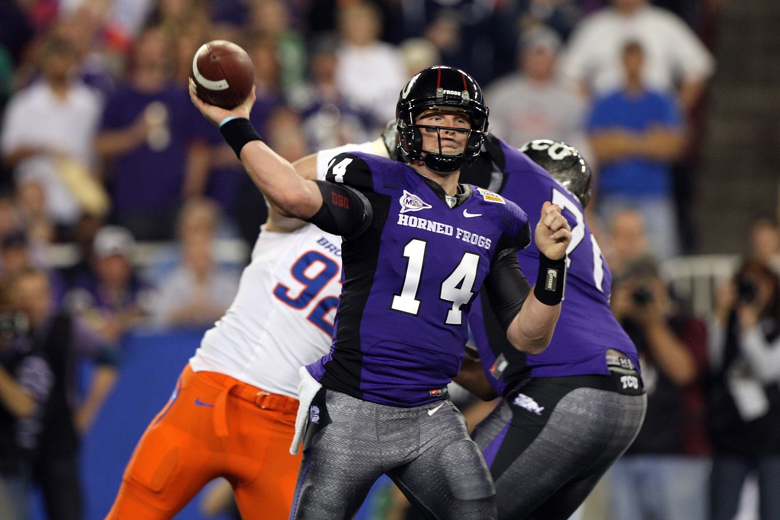 GLENDALE, AZ - JANUARY 04: Quarterback Andy Dalton #14 of the TCU Horned Frogs passes the ball against the Boise State Broncos during the Tostitos Fiesta Bowl at the Universtity of Phoenix Stadium on January 4, 2010 in Glendale, Arizona. (Photo by Jed J GLENDALE, AZ - JANUARY 04: Quarterback Andy Dalton #14 of the TCU Horned Frogs passes the ball against the Boise State Broncos during the Tostitos Fiesta Bowl at the Universtity of Phoenix Stadium on January 4, 2010 in Glendale, Arizona. (Photo by Jed J