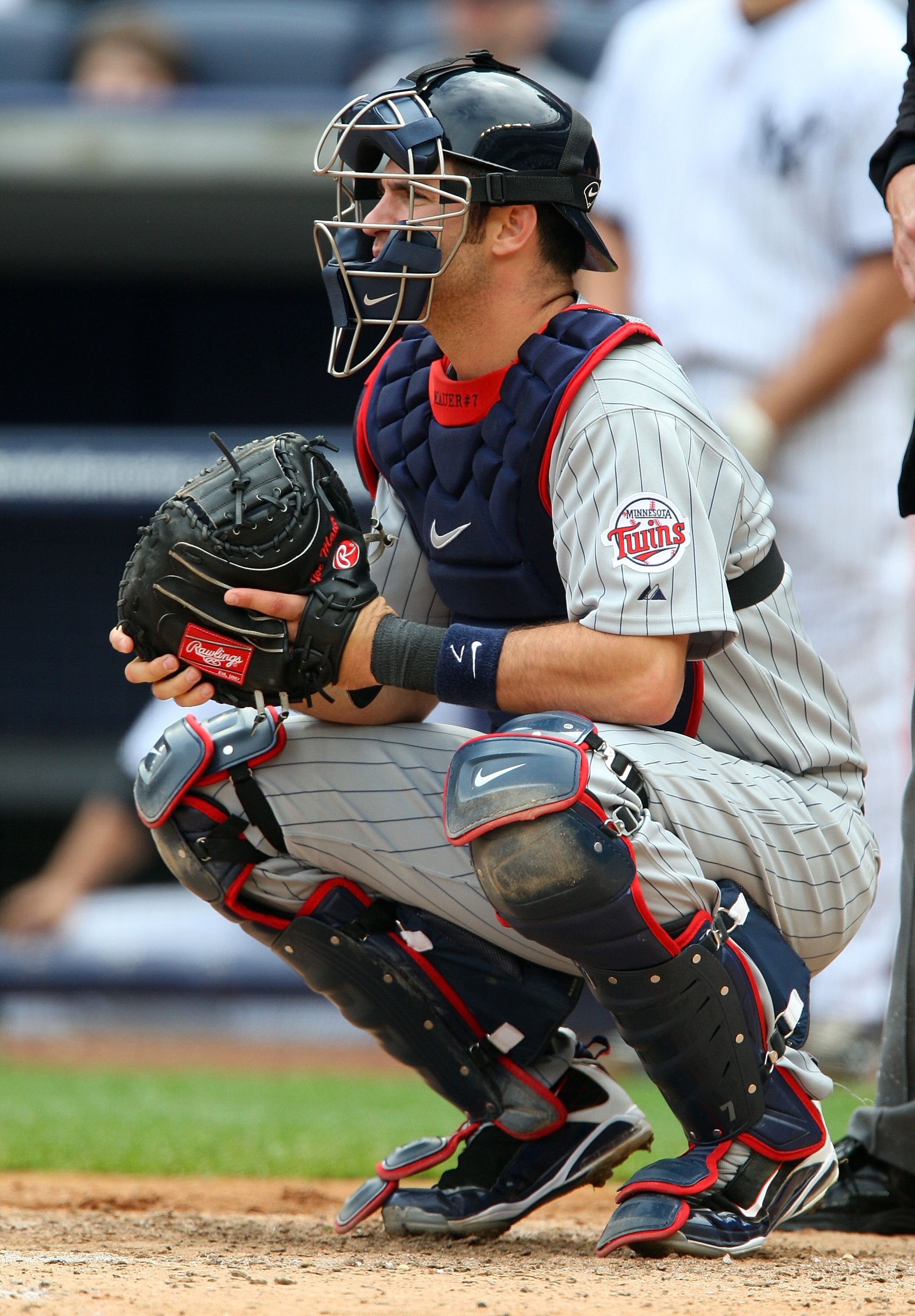 NEW YORK - MAY 17:  Joe Mauer #7 of the Minnesota Twins catches against the New York Yankees on May 17, 2009 at Yankee Stadium in the Bronx borough of New York City. The Yankees defeated the Twins 3-2 in ten innings.  (Photo by Jim McIsaac/Getty Images)