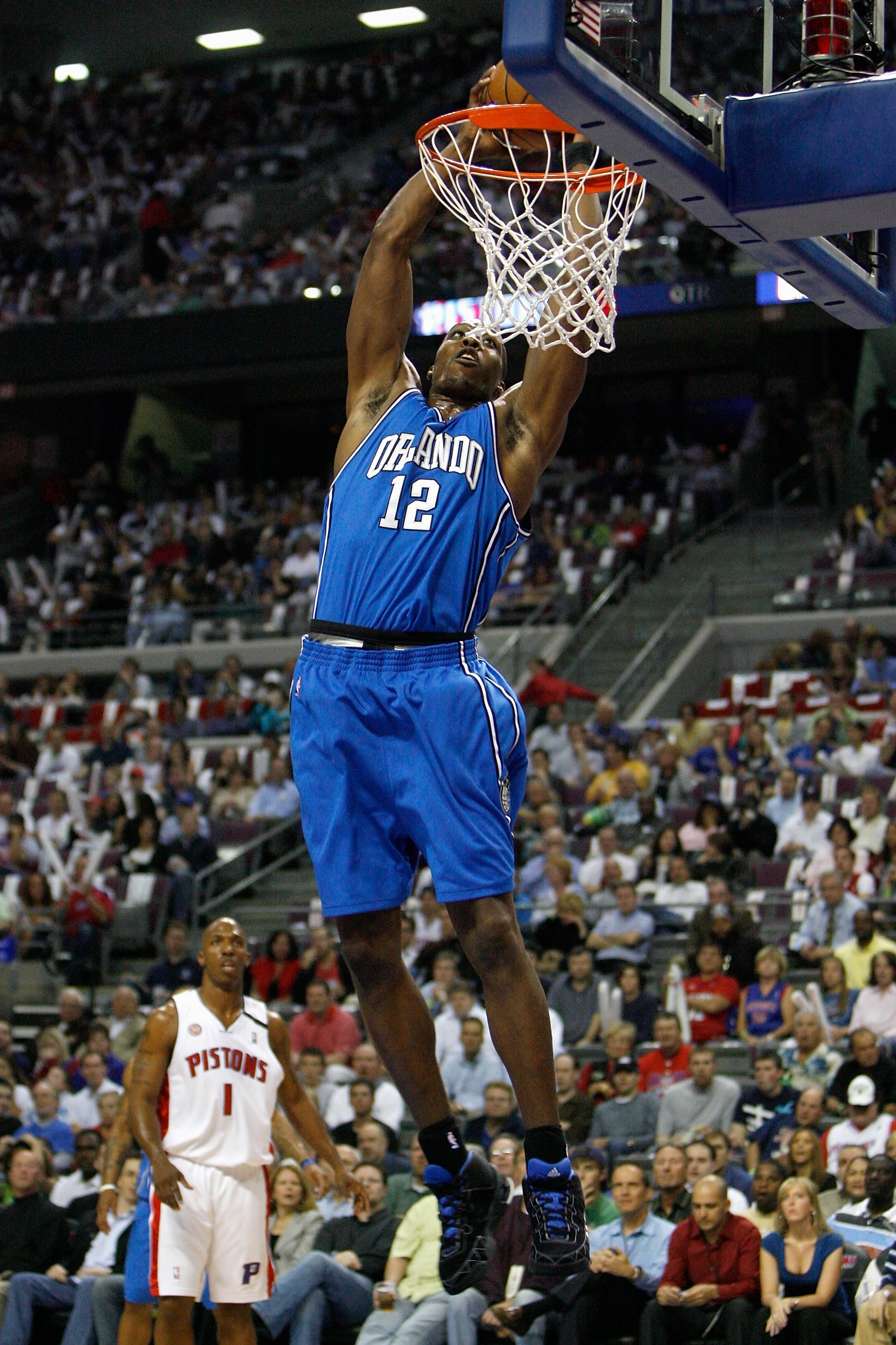 AUBURN HILLS, MI - MAY 5:  Dwight Howard #12 of the Orlando Magic slam dunks against the Detroit Pistons in Game Two of the Eastern Conference Semifinals during the 2008 NBA Playoffs on May 5, 2008 at the Palace of Auburn Hills in Auburn Hills, Michigan. 
