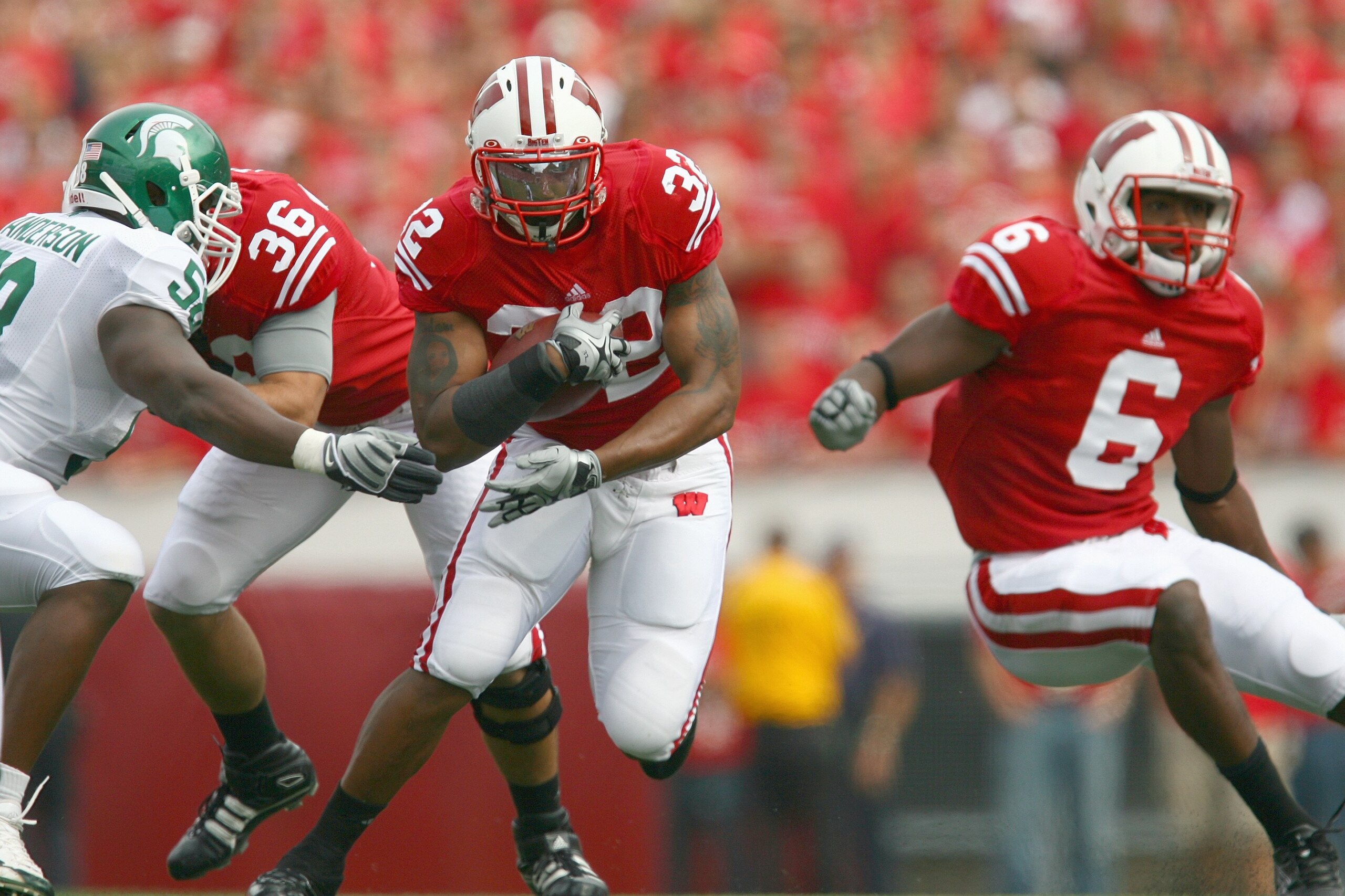 MADISON, WI - SEPTEMBER 26: John Clay #32 of the Wisconsin Badgers carries the ball against the Michigan State Spartans on September 26, 2009 at Camp Randall Stadium in Madison, Wisconsin. (Photo by Jonathan Daniel/Getty Images) MADISON, WI - SEPTEMBER 26: John Clay #32 of the Wisconsin Badgers carries the ball against the Michigan State Spartans on September 26, 2009 at Camp Randall Stadium in Madison, Wisconsin. (Photo by Jonathan Daniel/Getty Images)