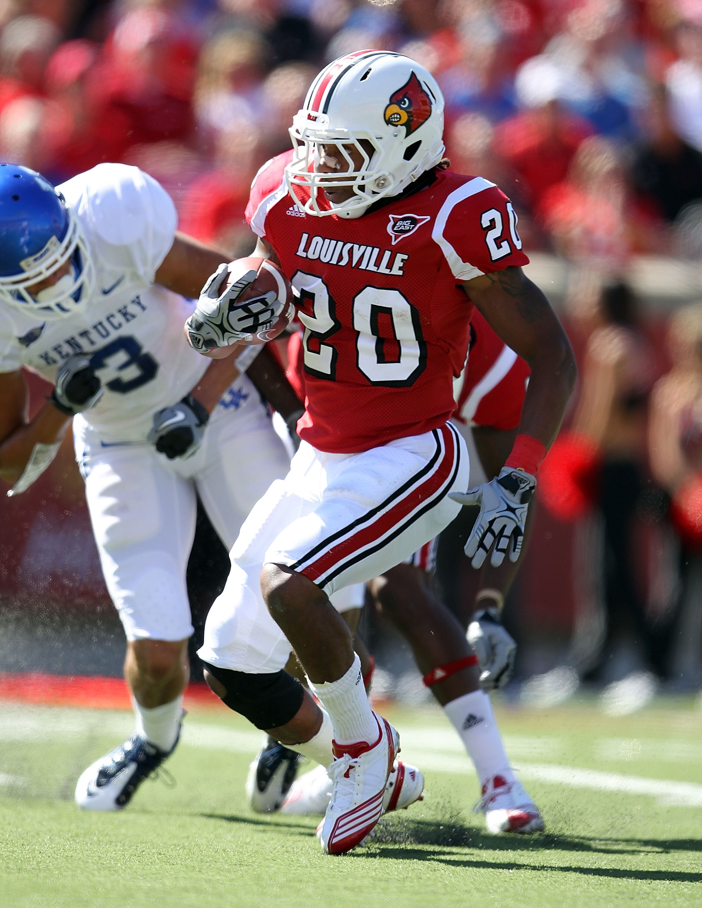 LOUISVILLE, KY - SEPTEMBER 04: Victor Anderson #20 of the Louisville Cardinals runs with the ball during the game against the  Kentucky Wildcats at Papa John's Cardinal Stadium on September 4, 2010 in Louisville, Kentucky.  (Photo by Andy Lyons/Getty Imag