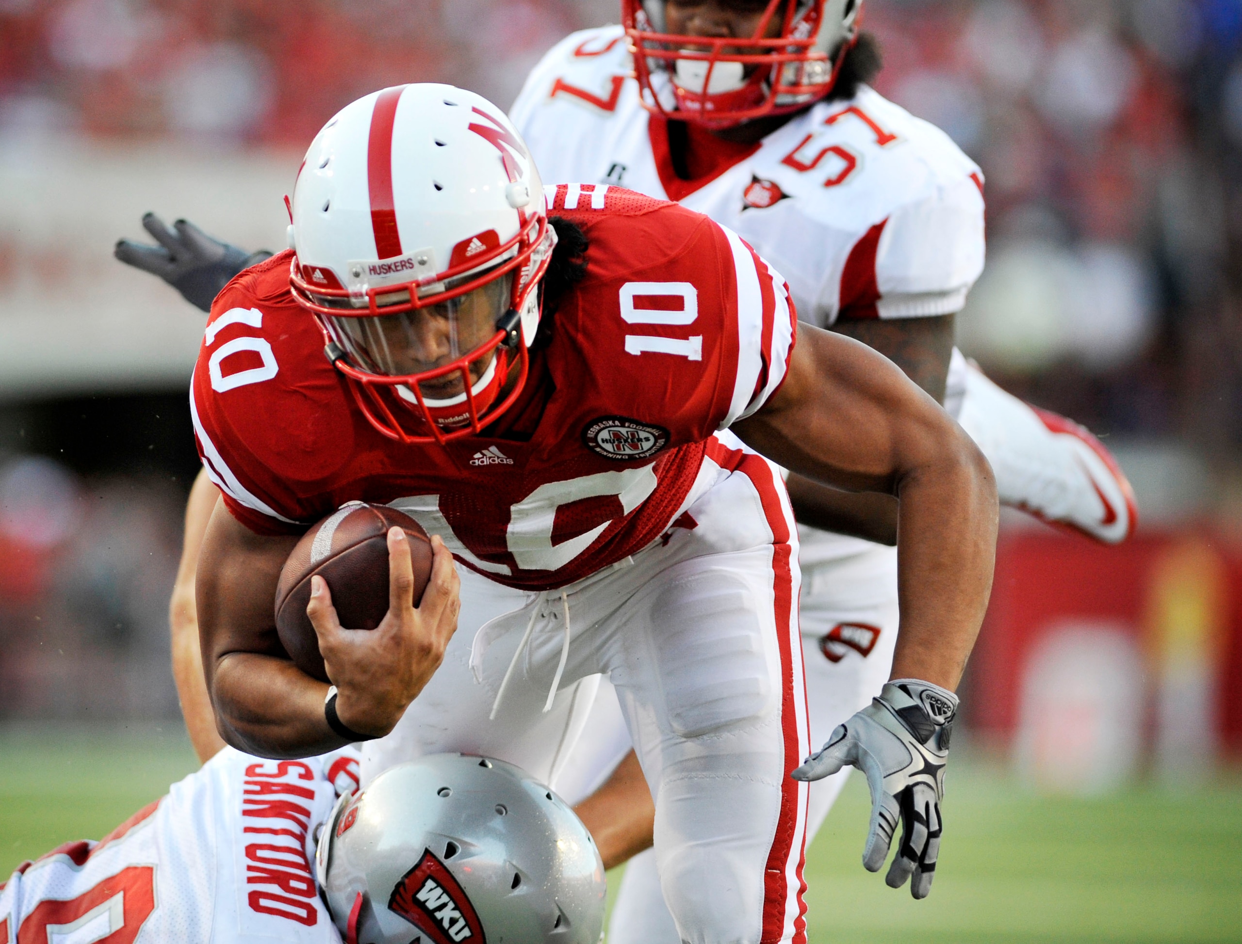 LINCOLN, NE - SEPTEMBER 04:  Roy Helu Jr. #10 of the Nebraska Cornhuskers drives toward the endzone during first half action of their game at Memorial Stadium on September 4, 2010 in Lincoln, Nebraska.  Nebraska Defeated Western Kentucky 49-10. (Photo by 