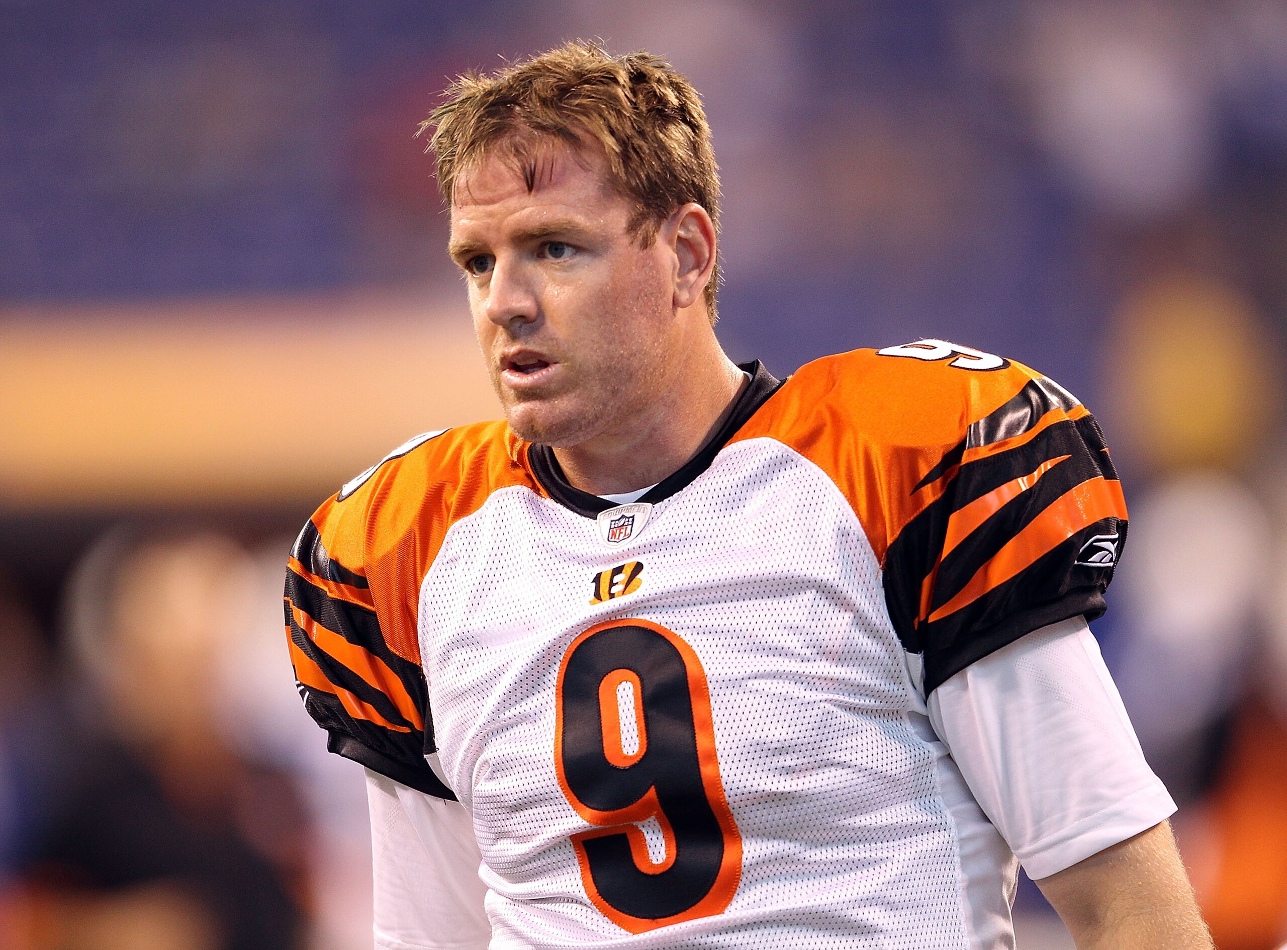 INDIANAPOLIS - SEPTEMBER 02:  Carson Palmer #9  of the Cincinnati Bengals talks with teammates during the NFL preseason game against the Indianapolis Colts at Lucas Oil Stadium on September 2, 2010 in Indianapolis, Indiana.  (Photo by Andy Lyons/Getty Ima