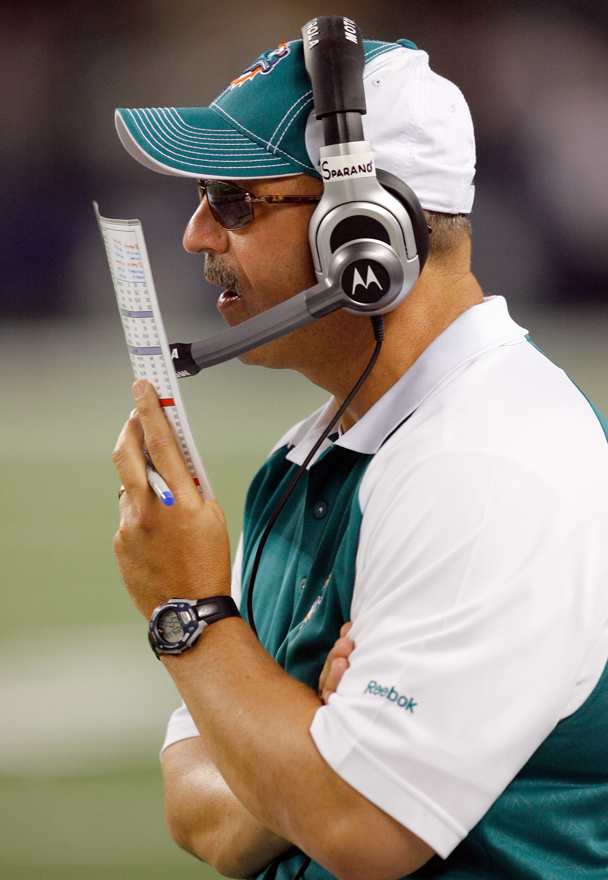 ARLINGTON, TX - SEPTEMBER 02: Miami Dophins head coach Tony Sparano leads his team against the Dallas Cowboys at Cowboys Stadium on September 2, 2010 in Arlington, Texas. (Photo by Tom Pennington/Getty Images)