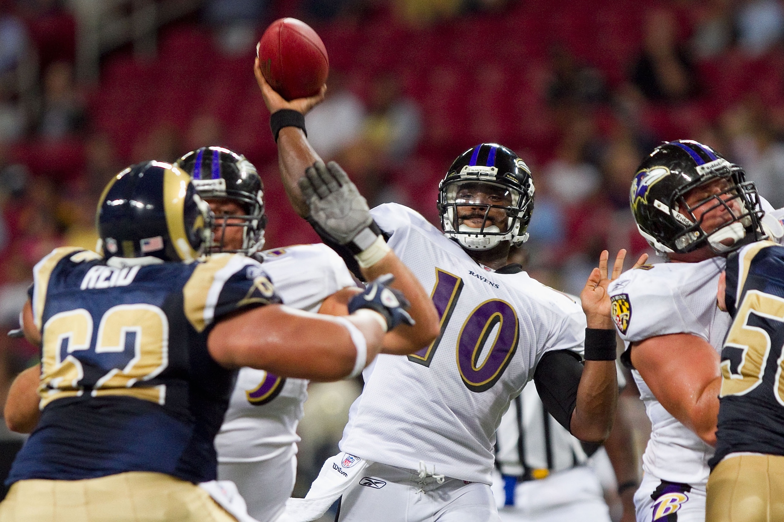 ST. LOUIS - SEPTEMBER 2: Troy Smith #10 of the Baltimore Ravens passes against the St. Louis Rams during an NFL preseason game at the Edward Jones Dome on September 2, 2010 in St. Louis, Missouri.  The Rams beat the Ravens 27-21.  (Photo by Dilip Vishwana