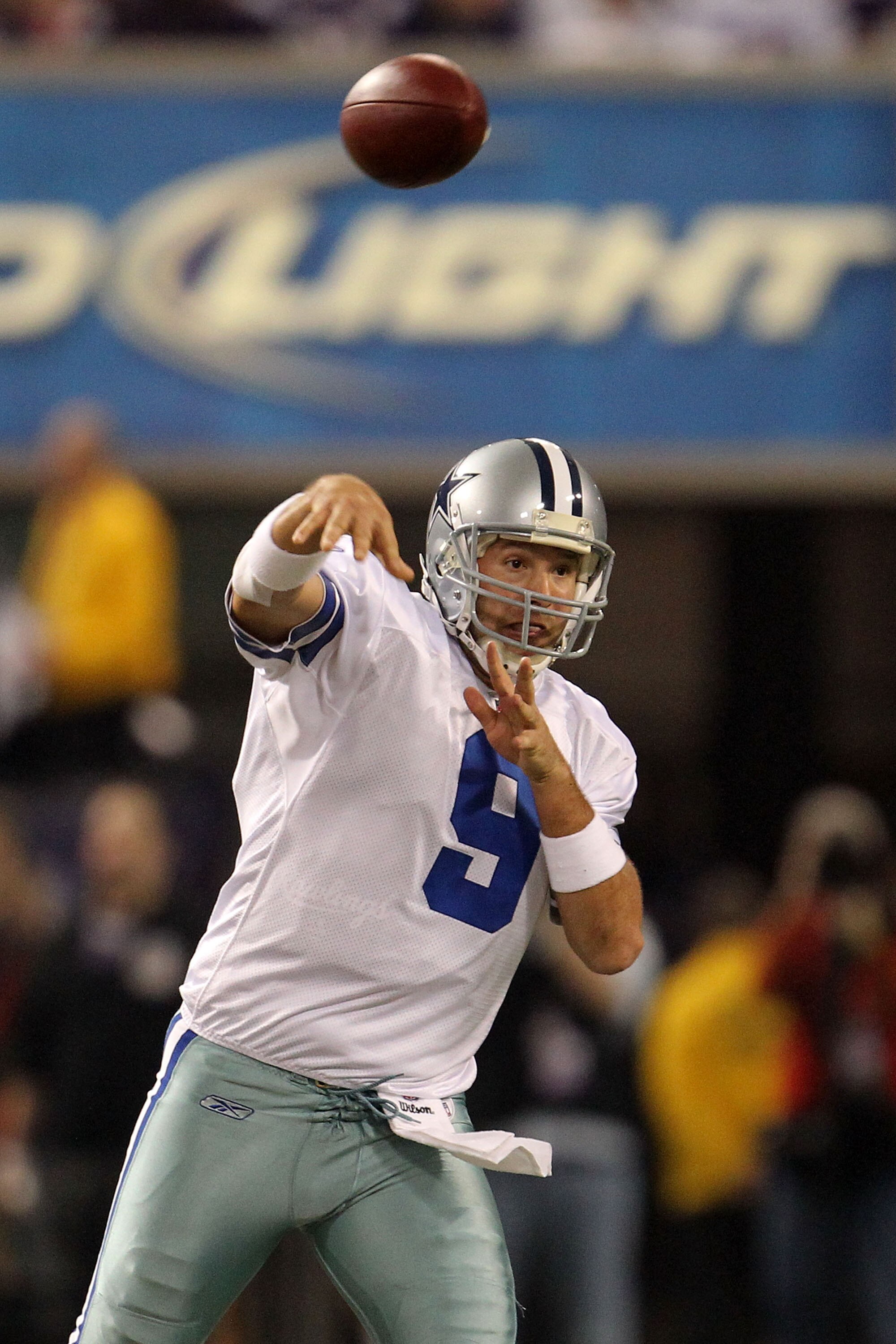 MINNEAPOLIS - JANUARY 17:  Tony Romo #9 of the Dallas Cowboys passes against the Minnesota Vikings in the first quarter of the NFC Divisional Playoff Game at Hubert H. Humphrey Metrodome on January 17, 2010 in Minneapolis, Minnesota.  (Photo by Chris McGr