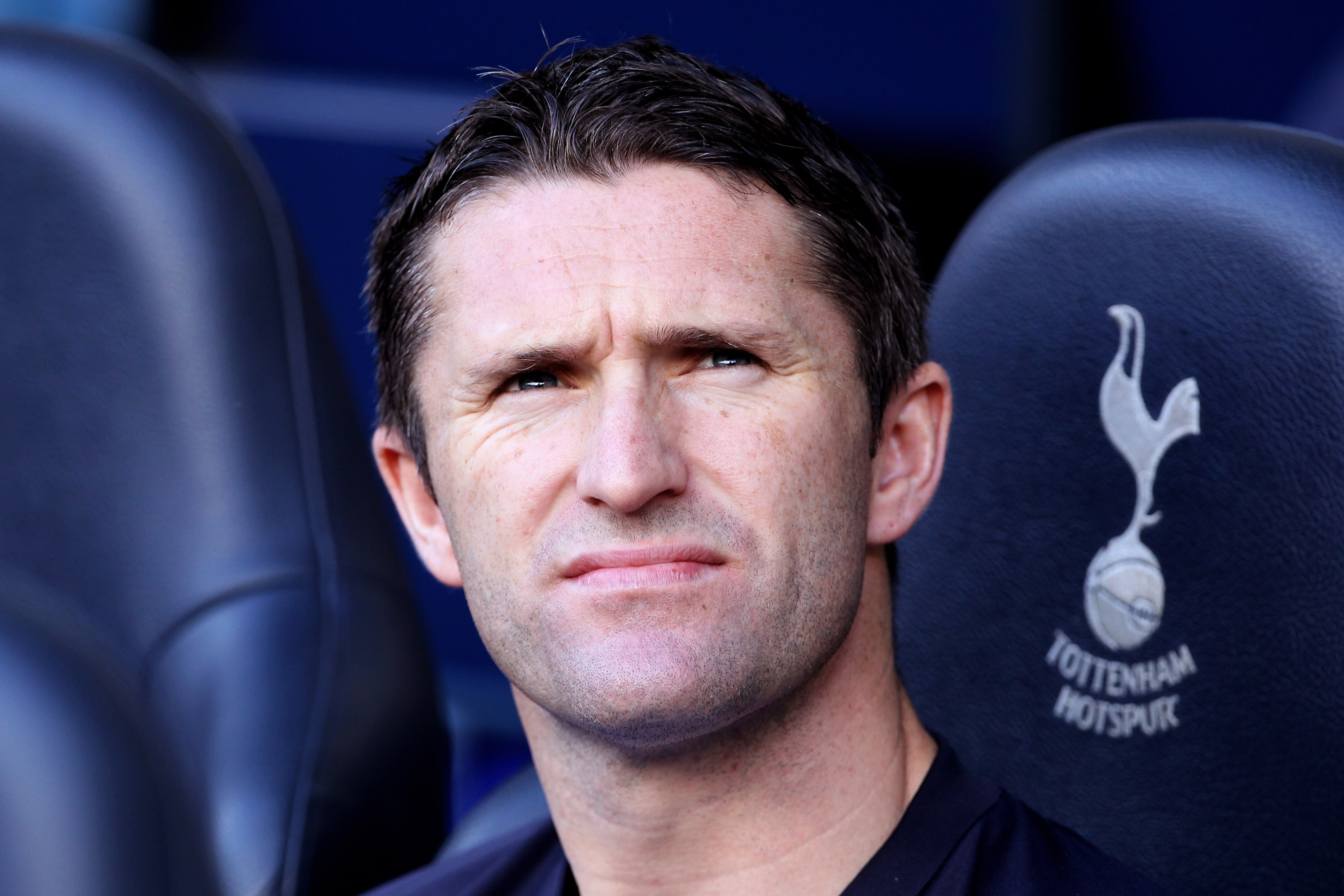 LONDON, ENGLAND - AUGUST 28:  Robbie Keane of Tottenham looks on from the bench during the Barclays Premier League match between Tottenham Hotspur and Wigan Athletic at White Hart Lane on August 28, 2010 in London, England.  (Photo by Phil Cole/Getty Imag