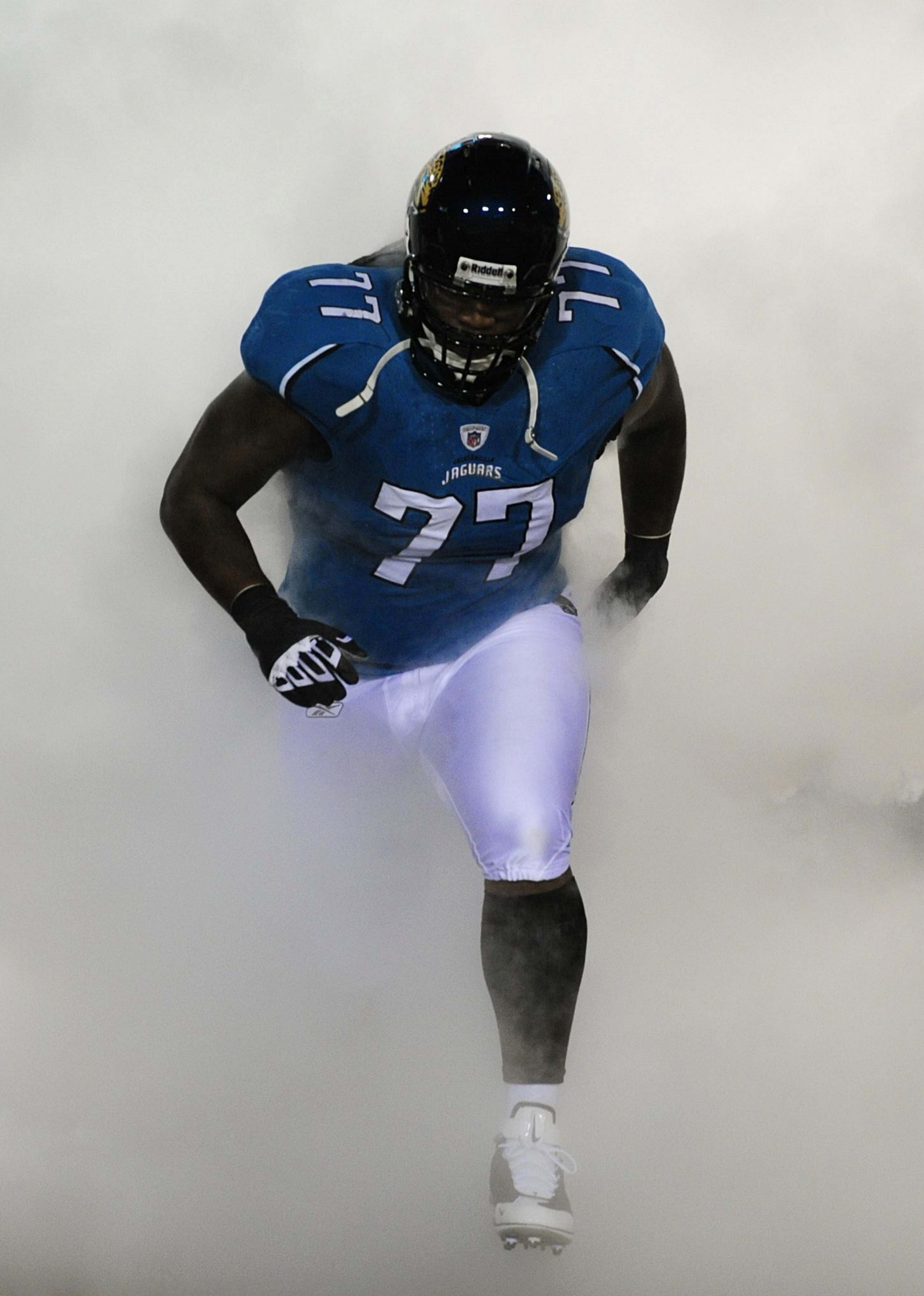 JACKSONVILLE, FL - DECEMBER 17:  Uche Nwaneri #77 of the Jacksonville Jaguars takes the field during player introductions against the Indianapolis Colts at Jacksonville Municipal Stadium on December 17, 2009 in Jacksonville, Florida.  (Photo by Sam Greenw
