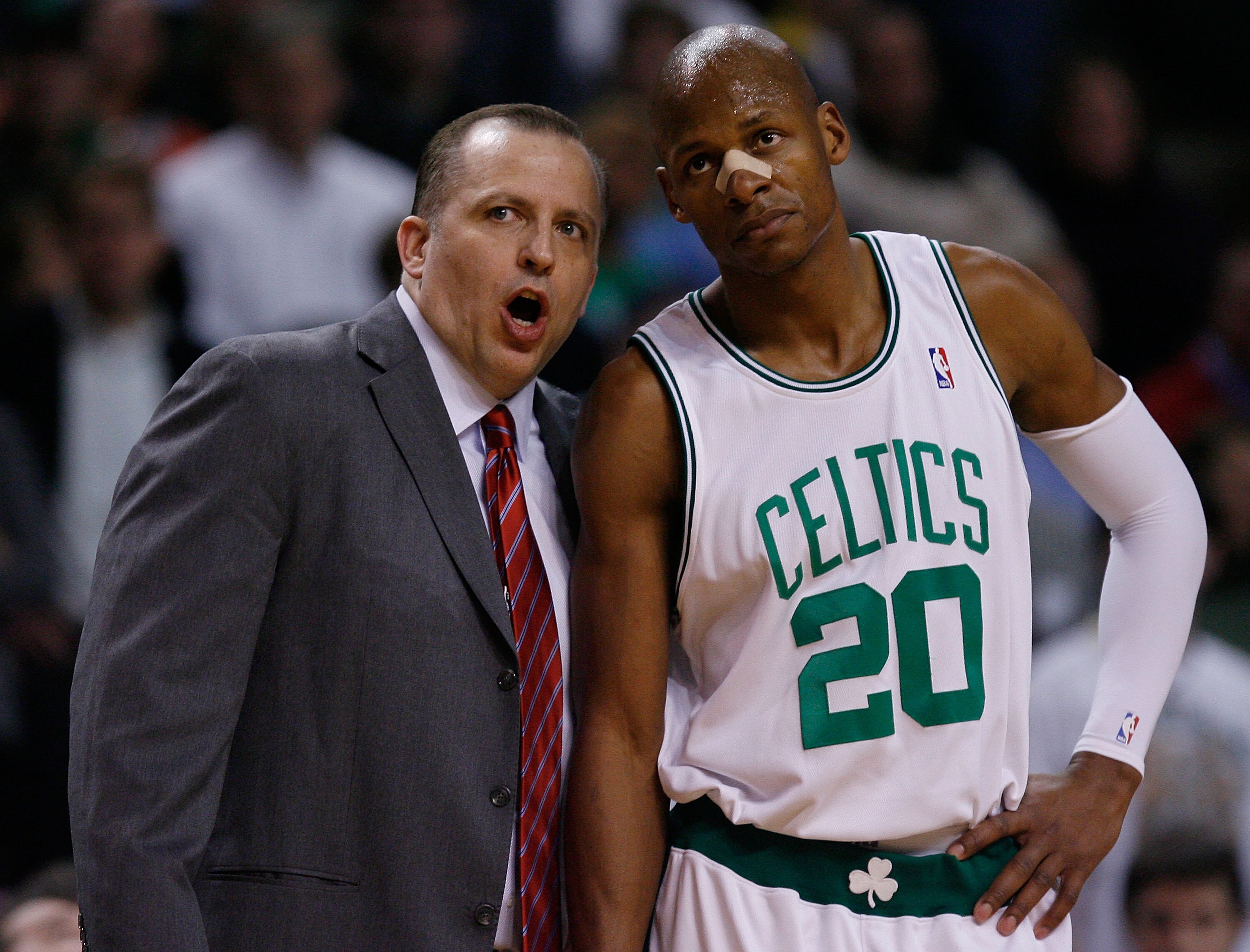 BOSTON - JANUARY 11:  Associate head coach Tom Thibodeau of the Boston Celtics talks with Ray Allen #20 during a break in play against the Atlanta Hawks at the TD Garden on January 11, 2010 in Boston, Massachusetts. The Hawks defeated the Celtics 102-96.