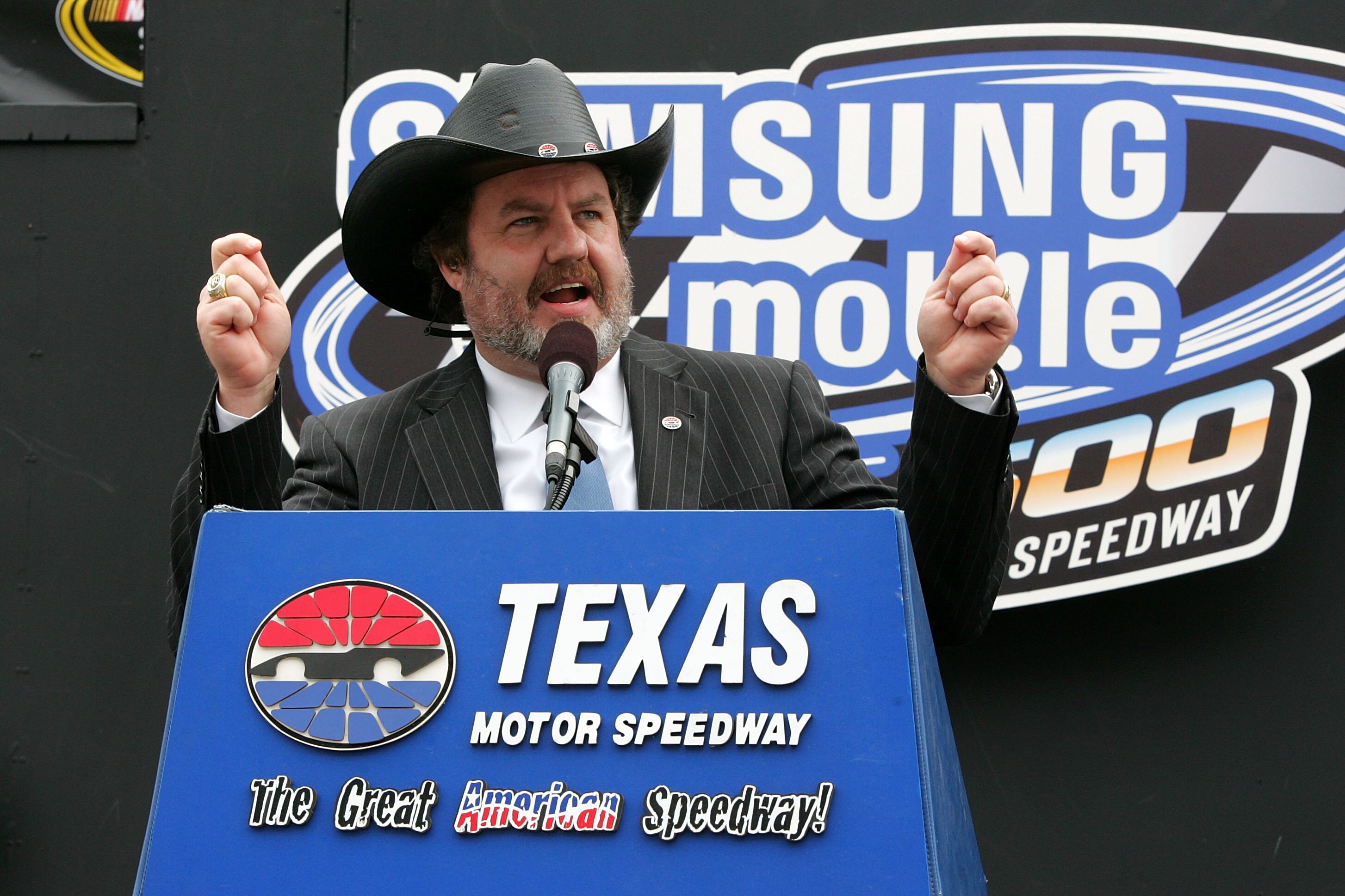 FORT WORTH, TX - APRIL 19:  President of Texas Motor Speedway Eddie Gossage addresses the fans during the NASCAR Sprint Cup Series Samsung Mobile 500 at Texas Motor Speedway on April 19, 2010 in Fort Worth, Texas.  (Photo by Jerry Markland/Getty Images fo