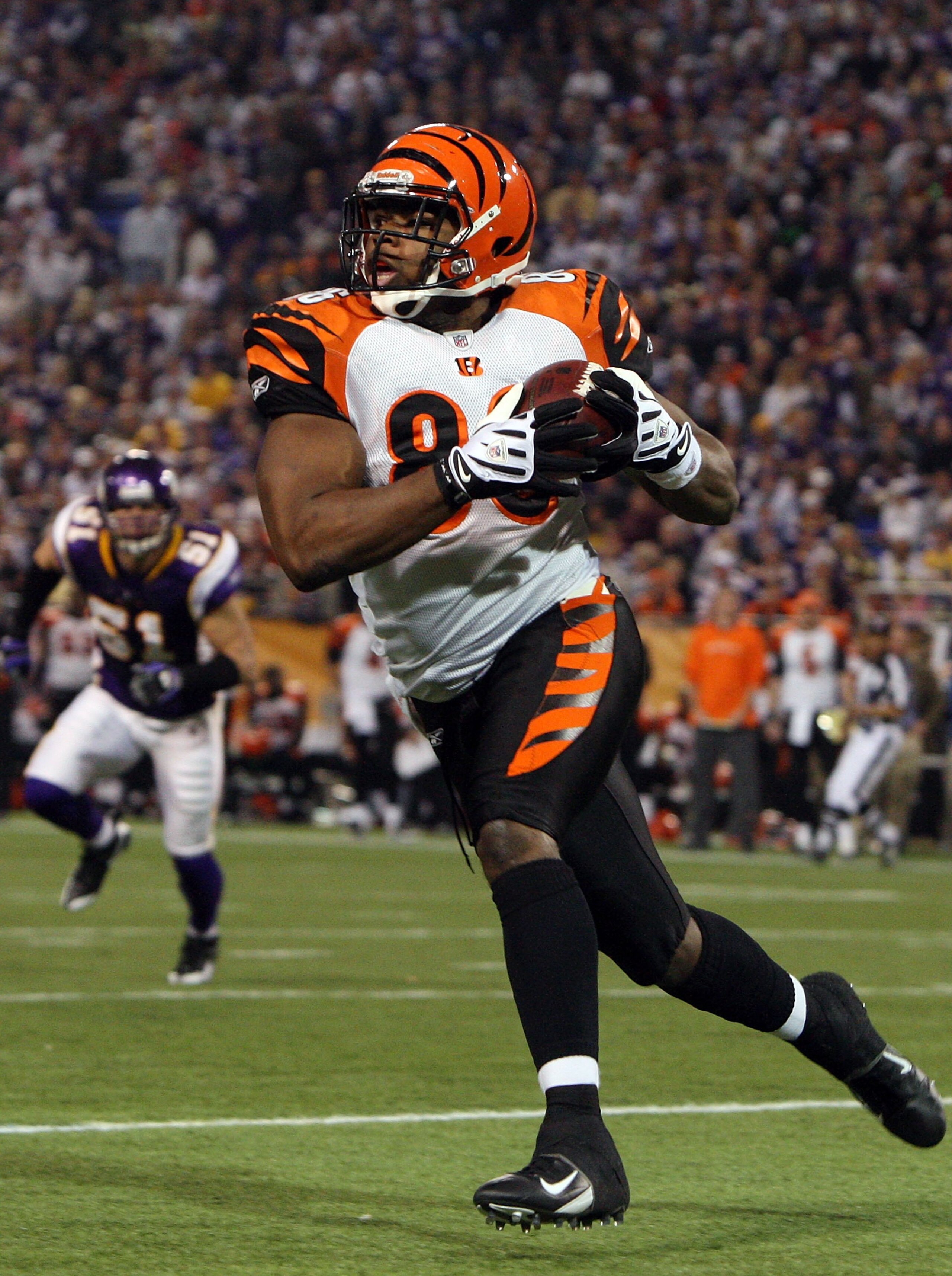 MINNEAPOLIS, MN - DECEMBER 13:  Daniel Coats #86 of the Cincinnati Bengals runs the ball against the Minnesota Vikings on December 13, 2009 at Hubert H. Humphrey Metrodome in Minneapolis, Minnesota. The Vikings defeated the Bengals 30-10.  (Photo by Jim M