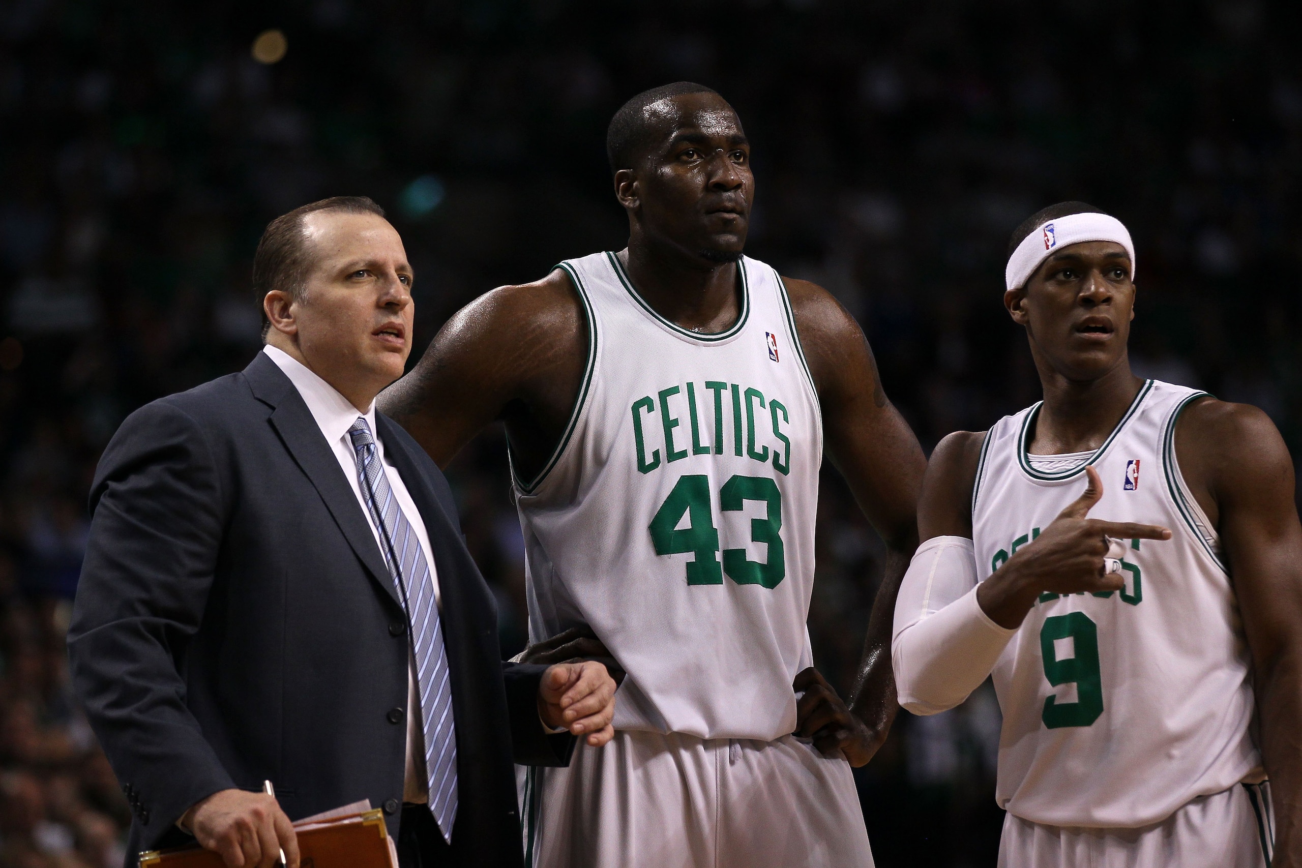 BOSTON - MAY 28: (L-R) Assistant coach Tom Thibodeau, Kendrick Perkins #43 and Rajon Rondo #9 of the Boston Celtics look on against the Orlando Magic in Game Six of the Eastern Conference Finals during the 2010 NBA Playoffs at TD Garden on May 28, 2010 i BOSTON - MAY 28: (L-R) Assistant coach Tom Thibodeau, Kendrick Perkins #43 and Rajon Rondo #9 of the Boston Celtics look on against the Orlando Magic in Game Six of the Eastern Conference Finals during the 2010 NBA Playoffs at TD Garden on May 28, 2010 i