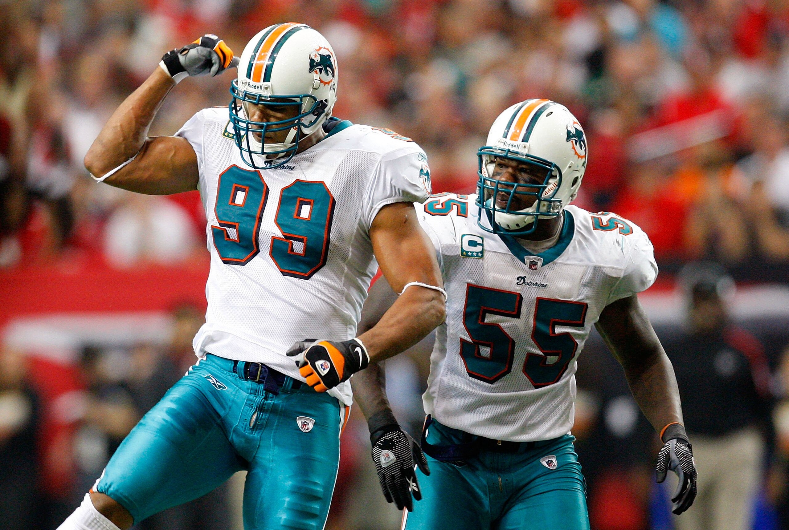 ATLANTA - SEPTEMBER 13:  Jason Taylor #99 and Joey Porter #55 of the Miami Dolphins against the Atlanta Falcons at Georgia Dome on September 13, 2009 in Atlanta, Georgia.  (Photo by Kevin C. Cox/Getty Images)
