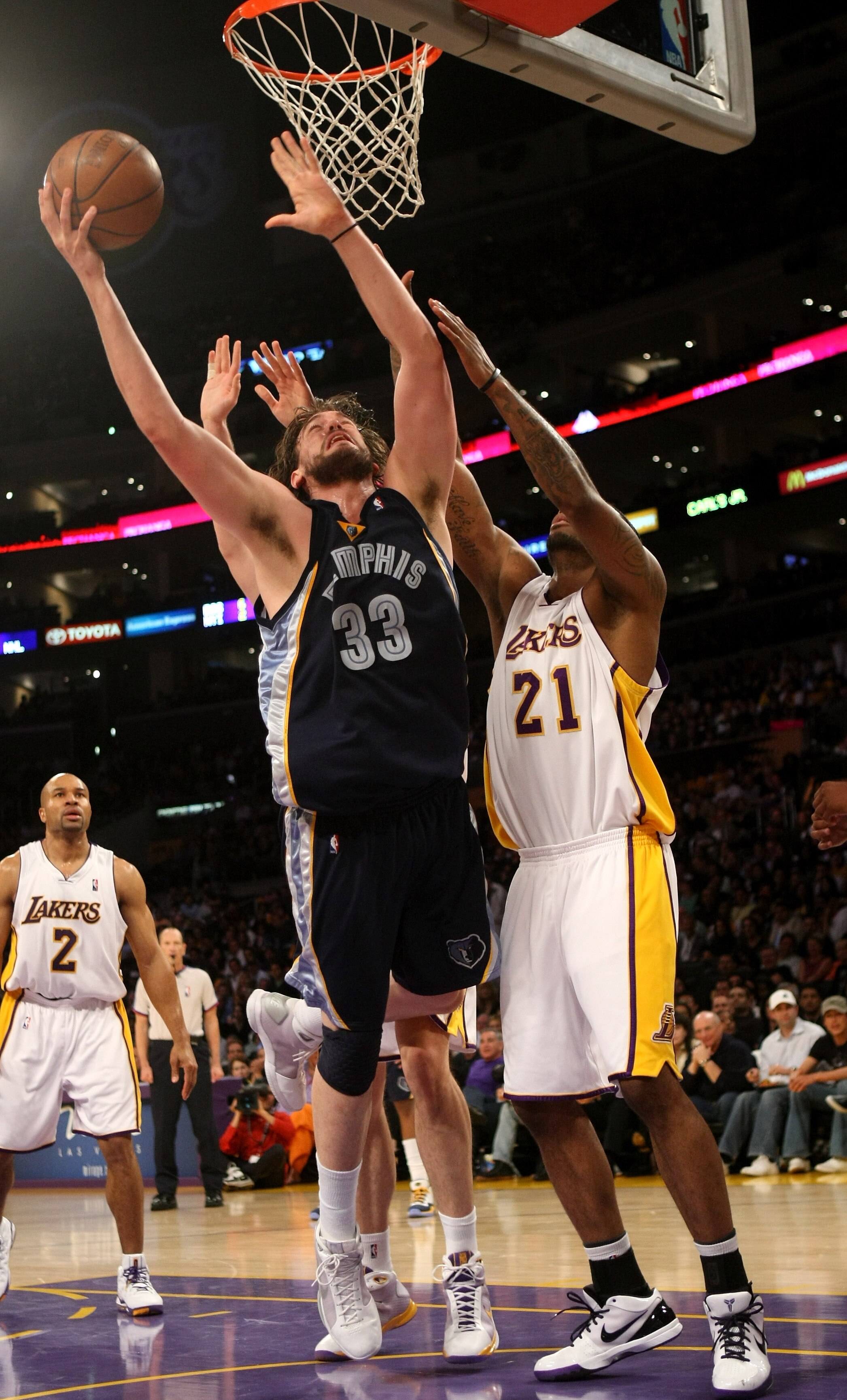 LOS ANGELES, CA - APRIL 12: Marc Gasol #33 of the Memphis Grizzlies goes up for a shot over Josh Powell #21 of the Los Angeles Lakers on April 12, 2009 at Staples Center in Los Angeles, California. The Lakers won 92-75. NOTE TO USER: User expressly acknow