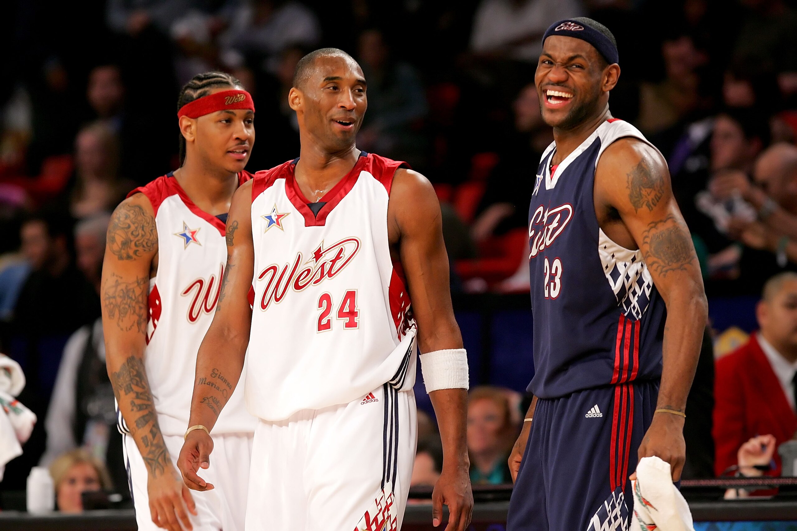 LAS VEGAS - FEBRUARY 18:  Carmelo Anthony #15 and Kobe Bryant #24 of the Western Conference and LeBron James #23 of the Eastern Conference share a laugh after the 2007 NBA All-Star Game on February 18, 2007 at Thomas & Mack Center in Las Vegas, Nevada.  T
