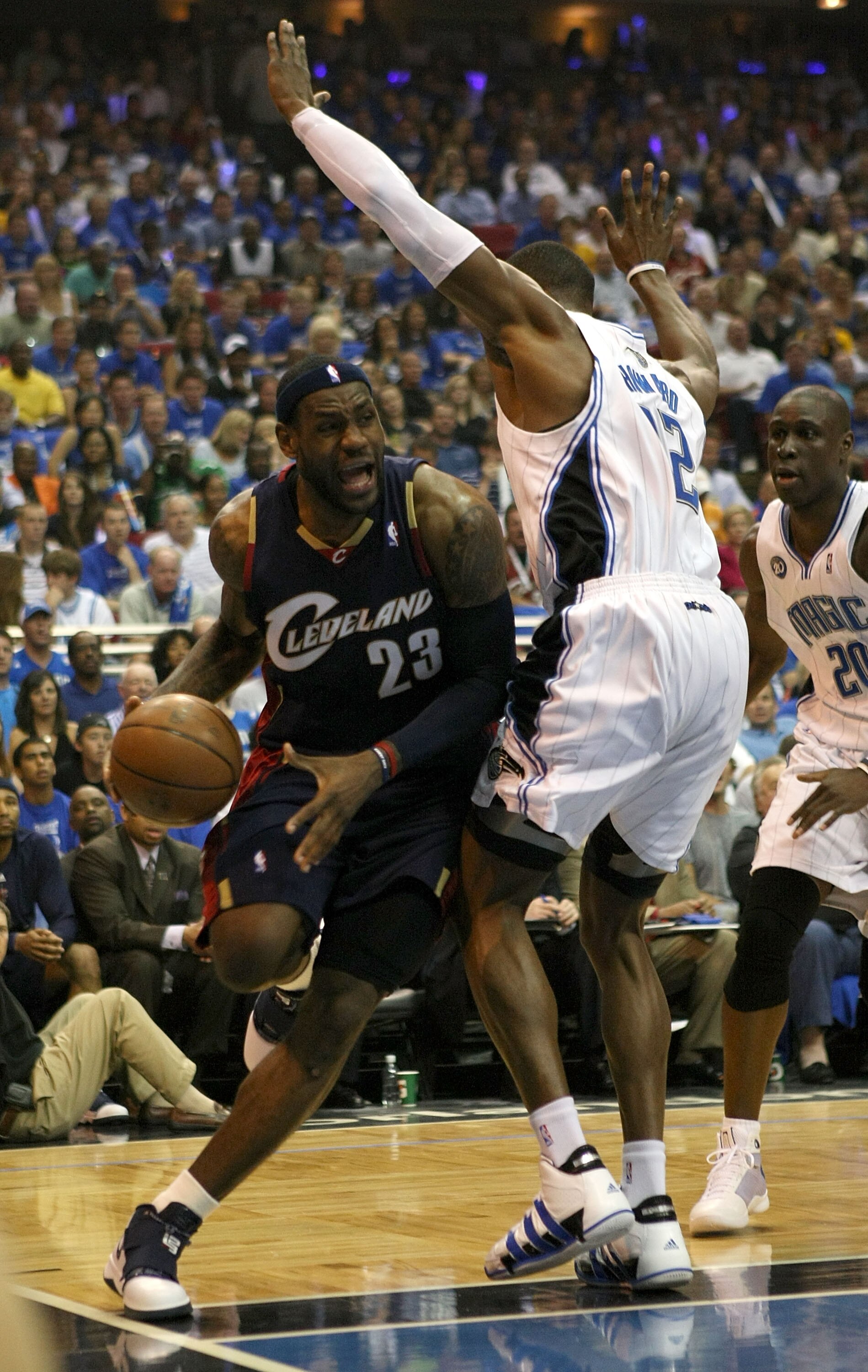 ORLANDO, FL - MAY 30: LeBron James #23 of the Cleveland Cavaliers drives to the hoop against Dwight Howard #12 of the Orlando Magic in Game Six of the Eastern Conference Finals during the 2009 Playoffs at Amway Arena on May 30, 2009 in Orlando, Florida. N