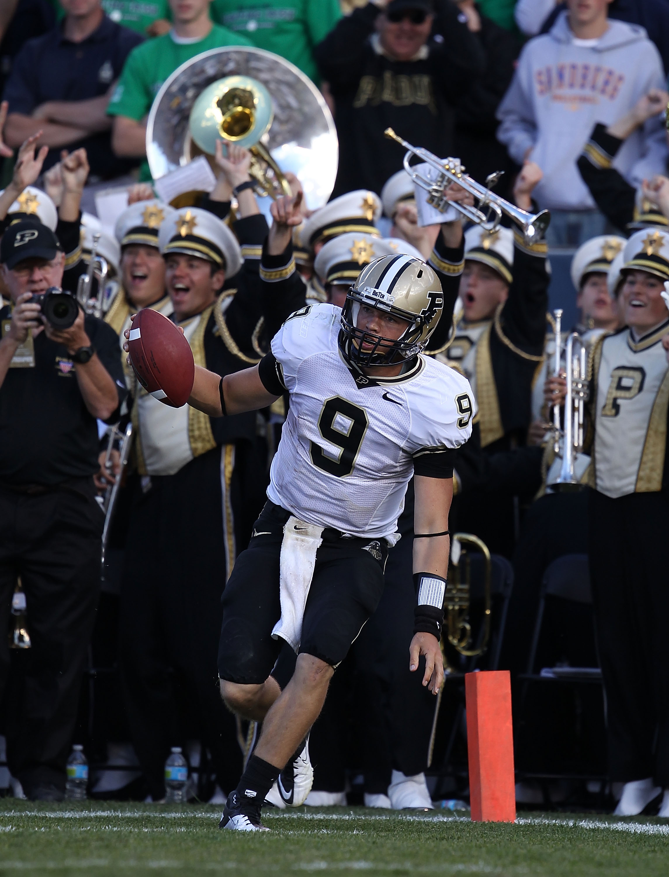 SOUTH BEND, IN - SEPTEMBER 04: Robert Marve #9 of the Purdue Boilermakers celebrates in the end zone after scoring a touchdown against the Notre Dame Fighting Irish at Notre Dame Stadium on September 4, 2010 in South Bend, Indiana. Notre Dame defated Purd