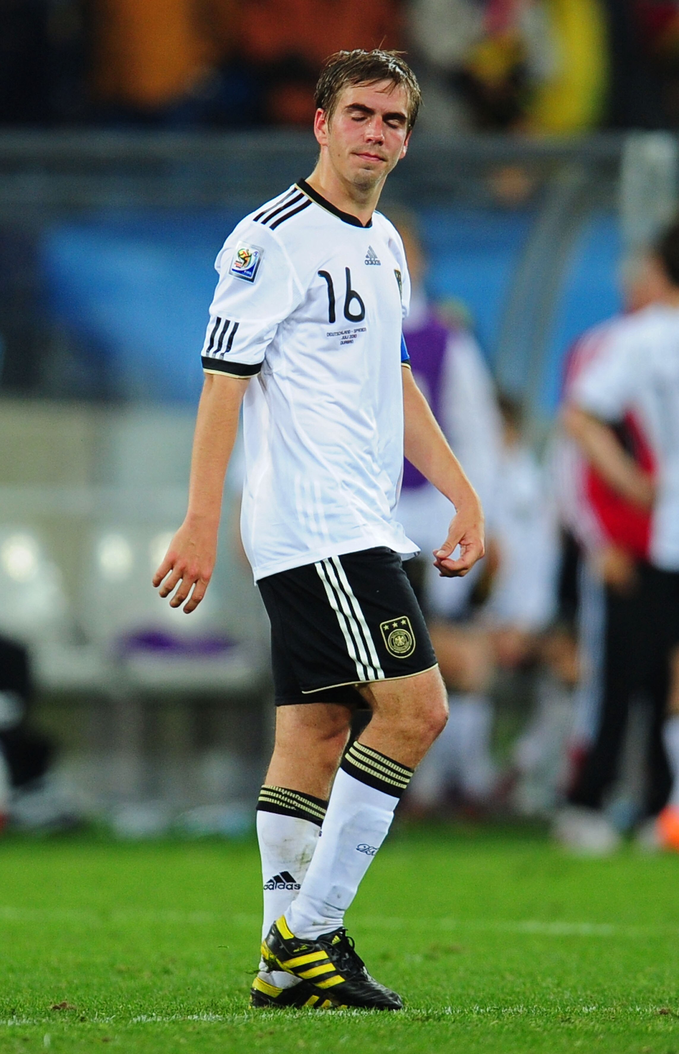 DURBAN, SOUTH AFRICA - JULY 07:  Dejected Philipp Lahm of Germany after being knocked out of the tournament during the 2010 FIFA World Cup South Africa Semi Final match between Germany and Spain at Durban Stadium on July 7, 2010 in Durban, South Africa.  