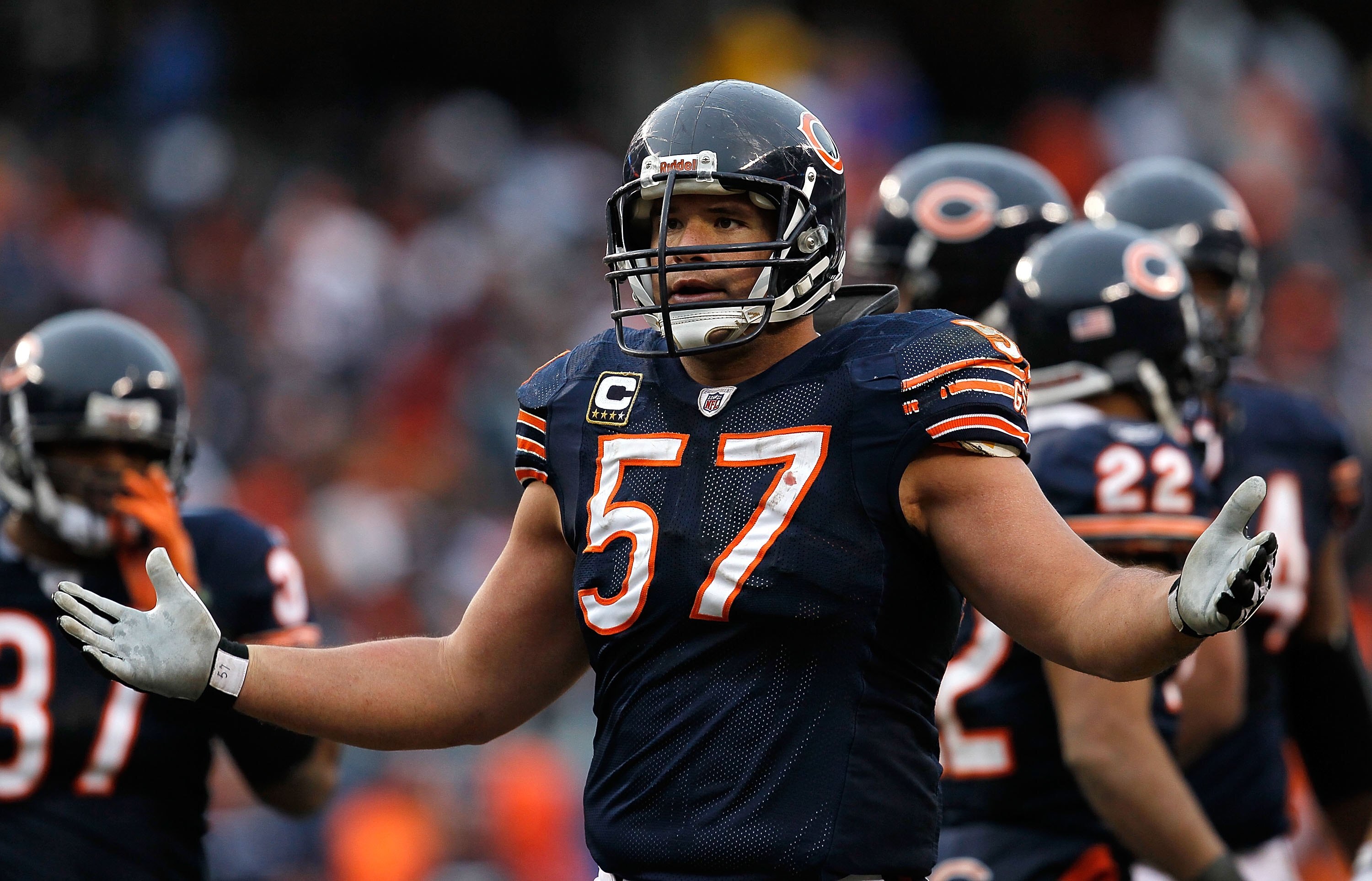 CHICAGO - DECEMBER 06: Olin Kreutz #57 of the Chicago Bears complains toa referee during a game against the St. Louis Rams at Soldier Field on December 6, 2009 in Chicago, Illinois. The Bears defeated the Rams 17-9. (Photo by Jonathan Daniel/Getty Images)