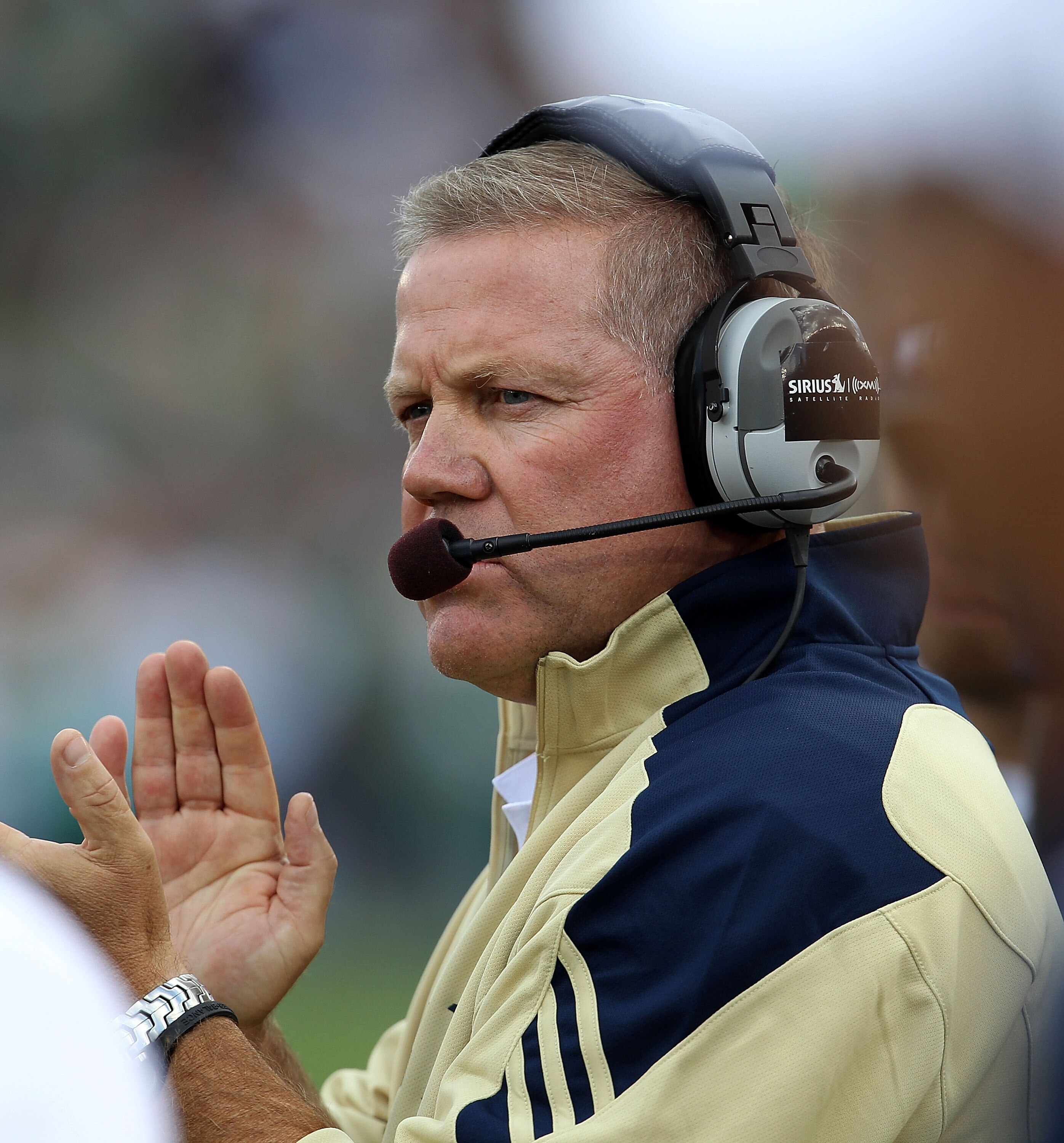 SOUTH BEND, IN - SEPTEMBER 04: Head coach Brian Kelly of the Notre Dame Fighting Irish encourages his team against the Purdue Boilermakers at Notre Dame Stadium on September 4, 2010 in South Bend, Indiana. (Photo by Jonathan Daniel/Getty Images)