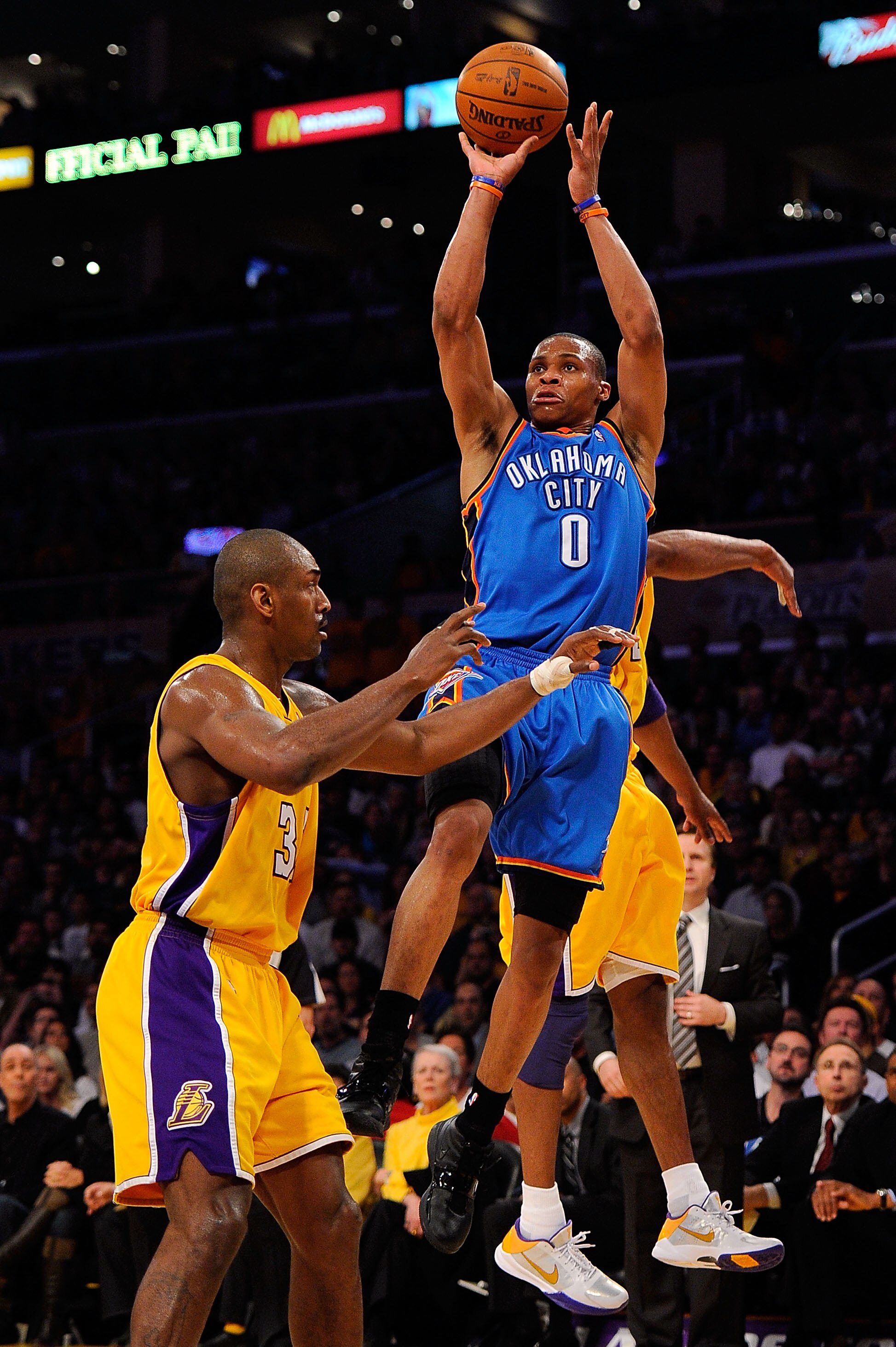 LOS ANGELES, CA - APRIL 27:  Russell Westbrook #0 of the Oklahoma City Thunder shoots over Ron Artest #37 of the Los Angeles Lakers in the first half during Game Two of the Western Conference Quarterfinals of the 2010 NBA Playoffs at Staples Center on Apr