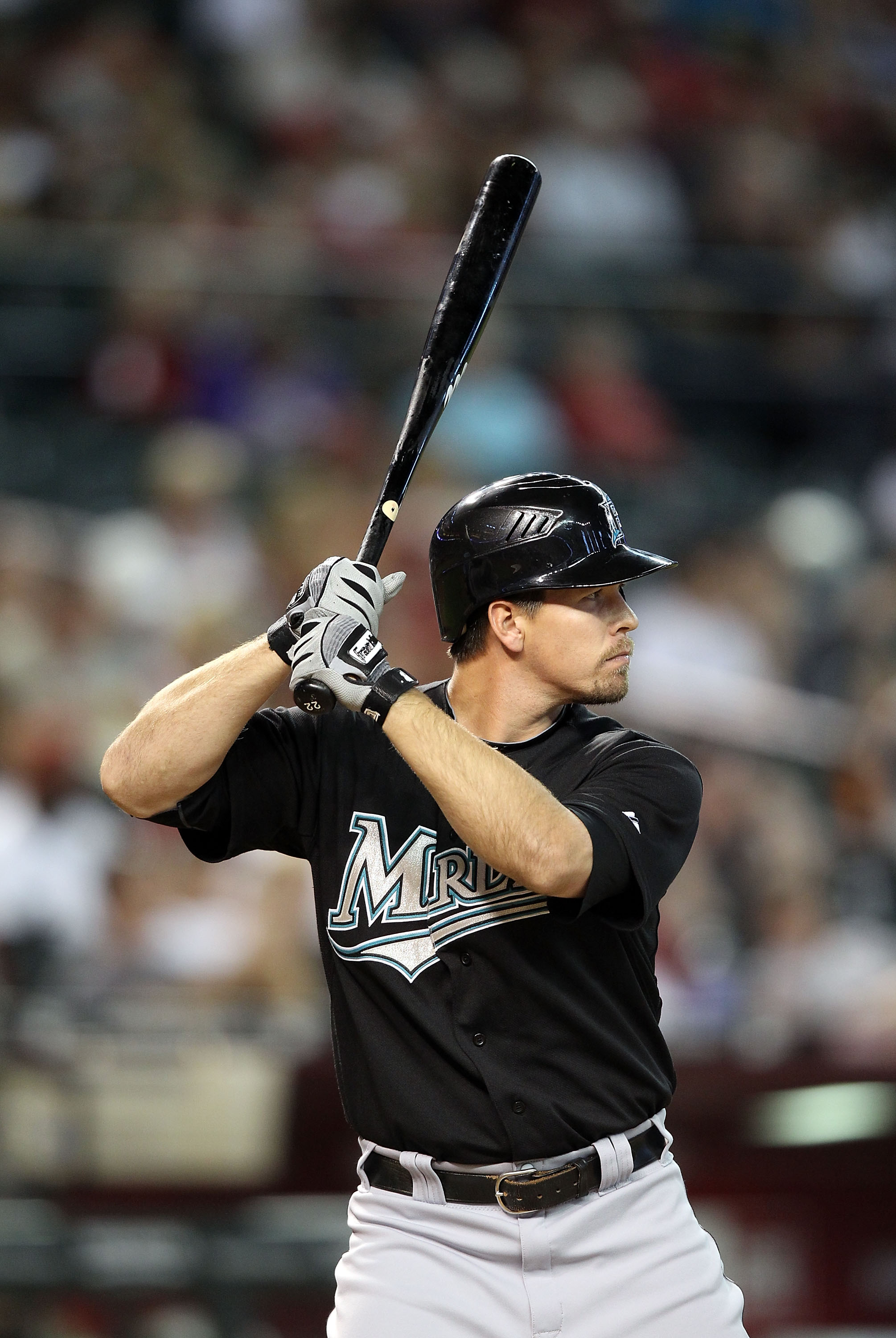 PHOENIX - JULY 11:  Donnie Murphy #22 of the Florida Marlins bats against the Arizona Diamondbacks during the Major League Baseball game at Chase Field on July 11, 2010 in Phoenix, Arizona.  The Marlins defeated the Diamondbacks 2-0.  (Photo by Christian 