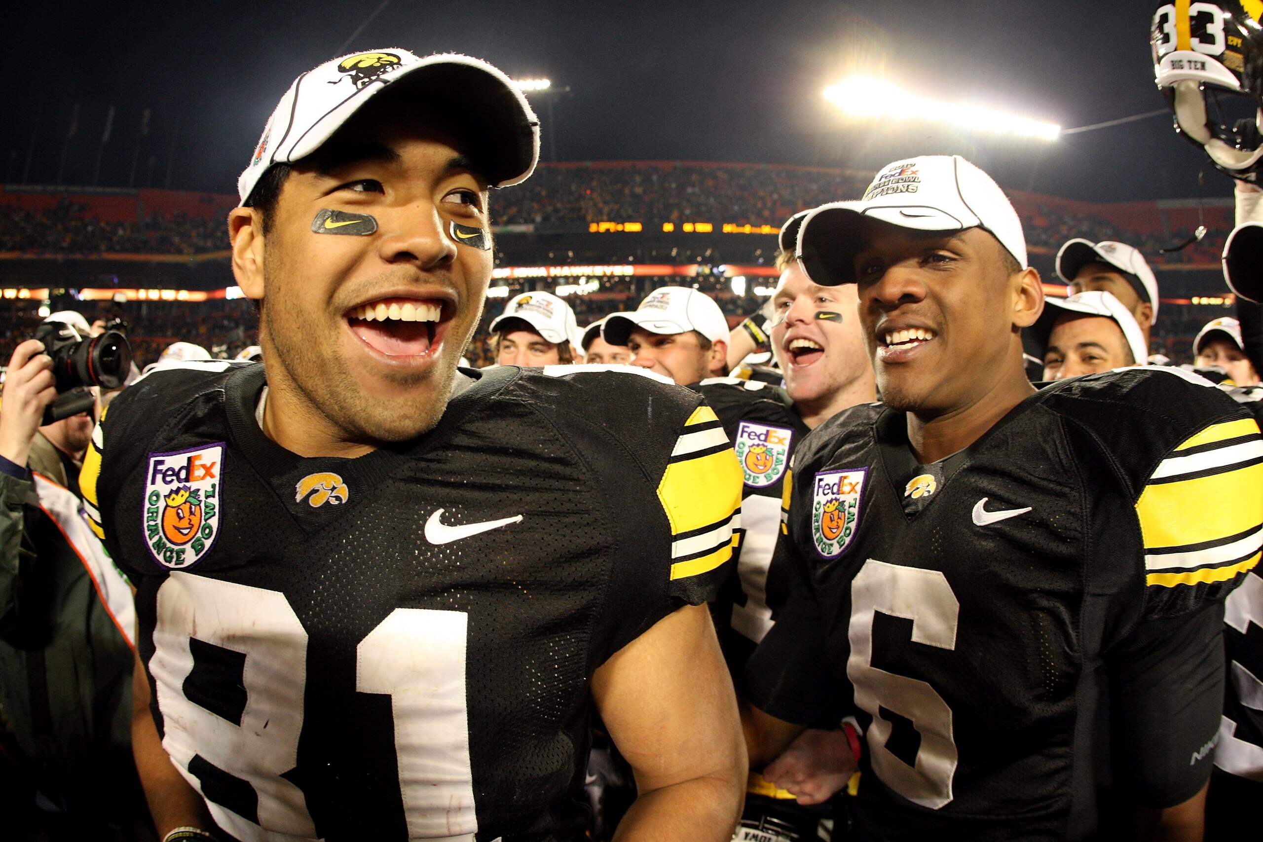 MIAMI GARDENS, FL - JANUARY 05: (L-R) Tony Moeaki #81 and Keenan Davis #6 of the Iowa Hawkeyes celebrate after Iowa won 24-14 against the Georgia Tech Yellow Jackets during the FedEx Orange Bowl at Land Shark Stadium on January 5, 2010 in Miami Gardens, MIAMI GARDENS, FL - JANUARY 05: (L-R) Tony Moeaki #81 and Keenan Davis #6 of the Iowa Hawkeyes celebrate after Iowa won 24-14 against the Georgia Tech Yellow Jackets during the FedEx Orange Bowl at Land Shark Stadium on January 5, 2010 in Miami Gardens,