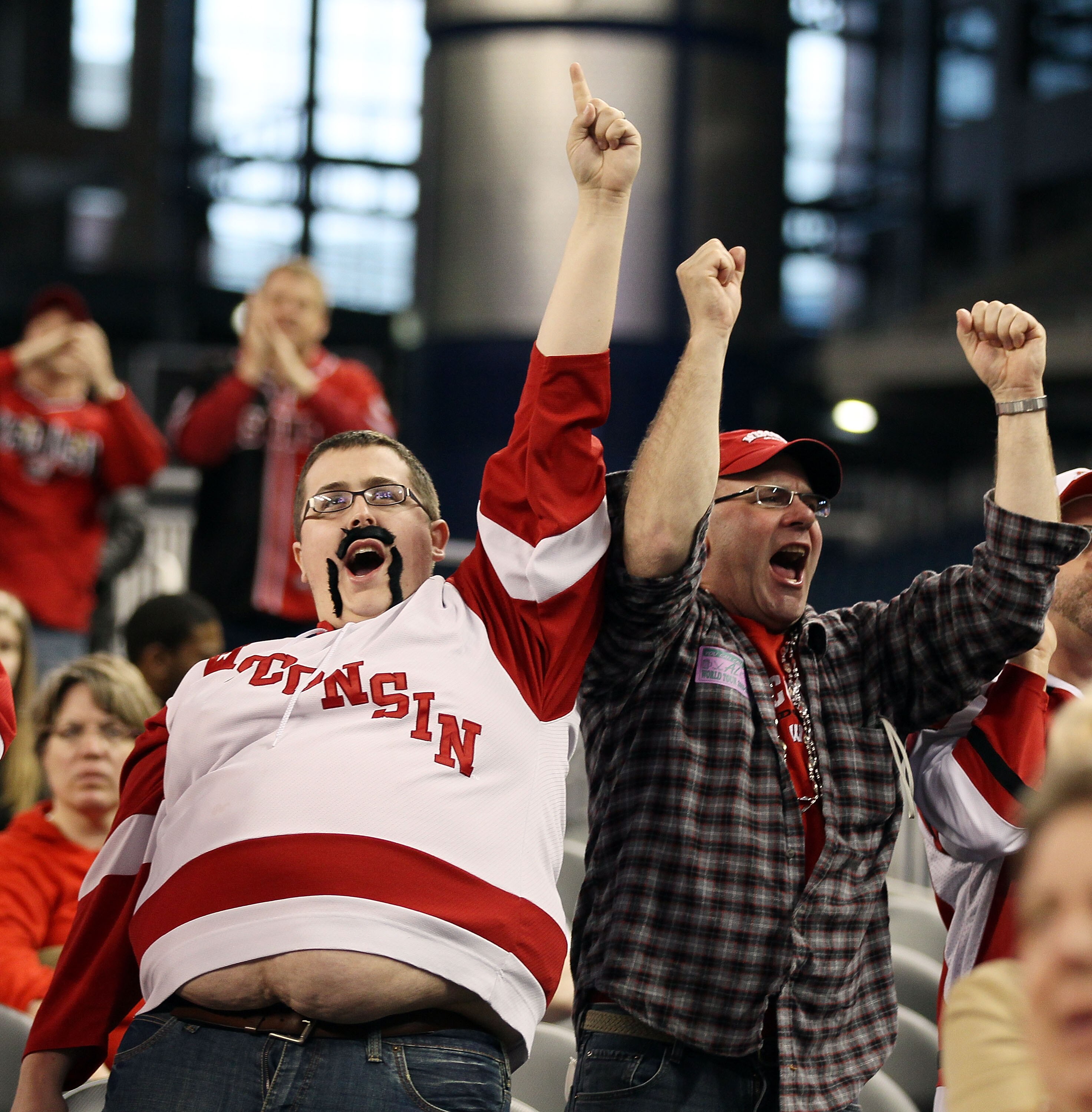 DETROIT - APRIL 10:  Wisconsin Badgers cheer on their team against the Boston College Eagles during the championship game of the 2010 NCAA Frozen Four on April 10, 2010 at Ford Field in Detroit, Michigan.  (Photo by Elsa/Getty Images)
