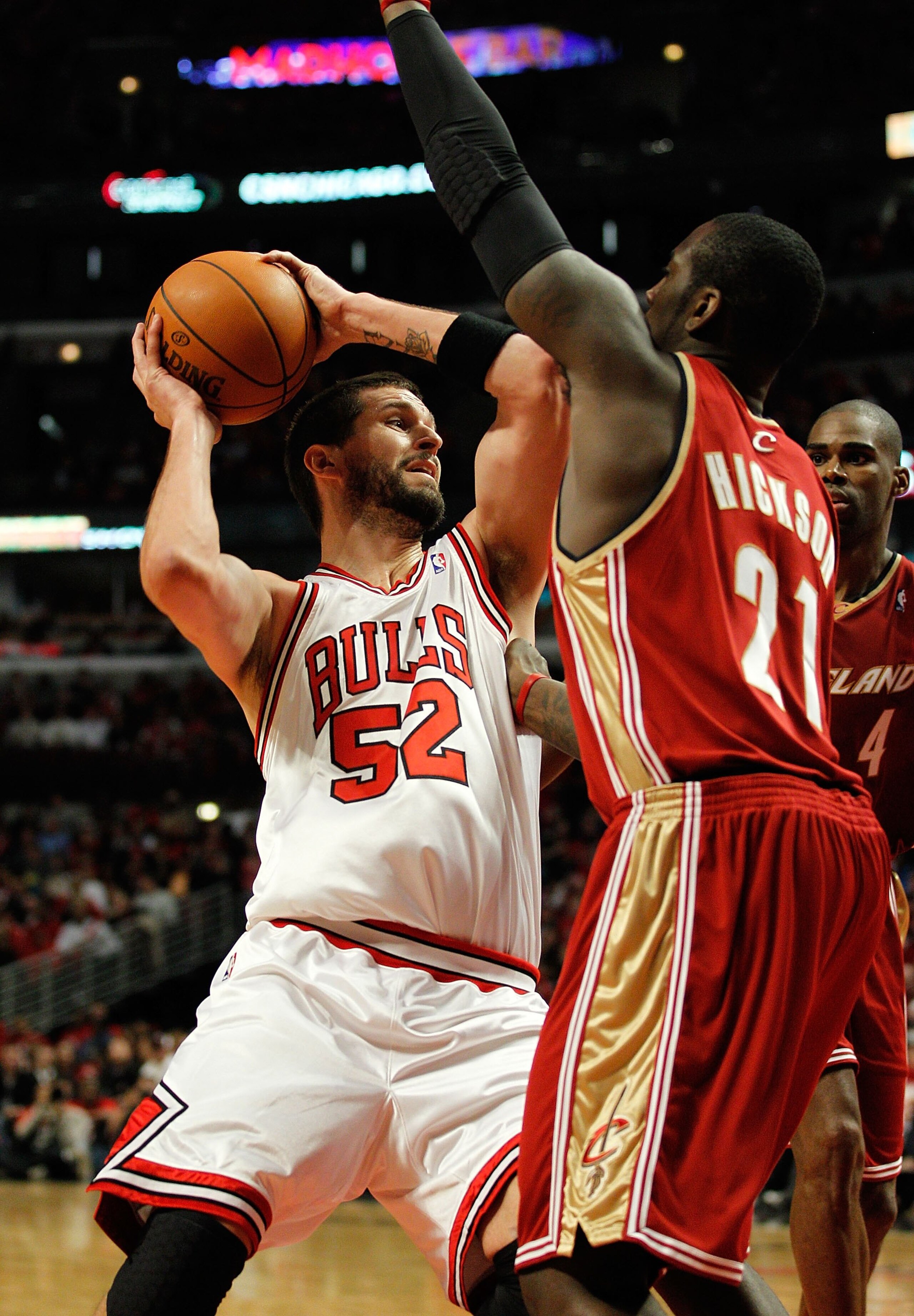 CHICAGO - APRIL 25: Brad Miller #52 of the Chicago Bulls puts up a shot against J.J. Hickson #21 of the Cleveland Cavaliers in Game Four of the Eastern Conference Quarterfinals during the 2010 NBA Playoffs at the United Center on April 25, 2010 in Chicago