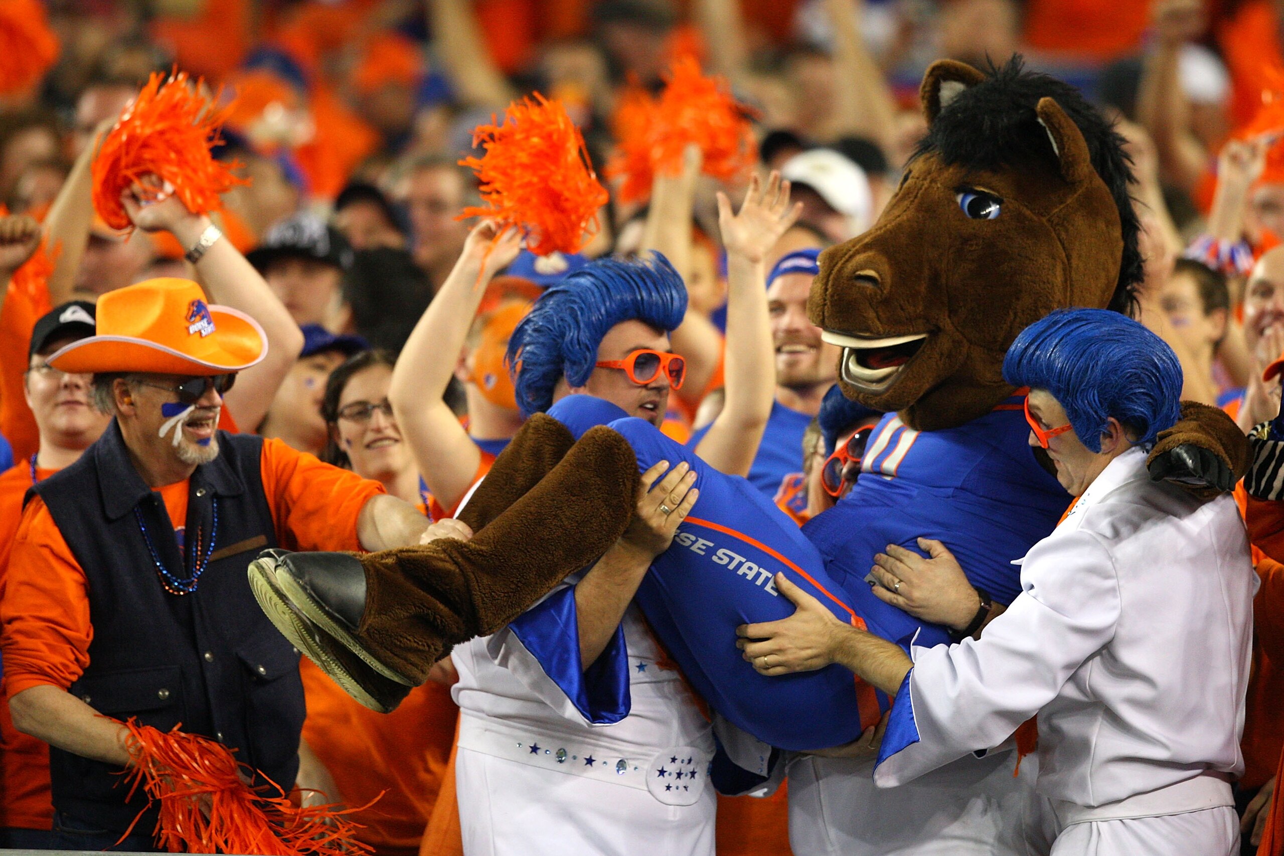 GLENDALE, AZ - JANUARY 04:  The Boise State Broncos mascot is picked up by some Broncos fans in the first half against the TCU Horned Frogs during the Tostitos Fiesta Bowl at the Universtity of Phoenix Stadium on January 4, 2010 in Glendale, Arizona.  (Ph