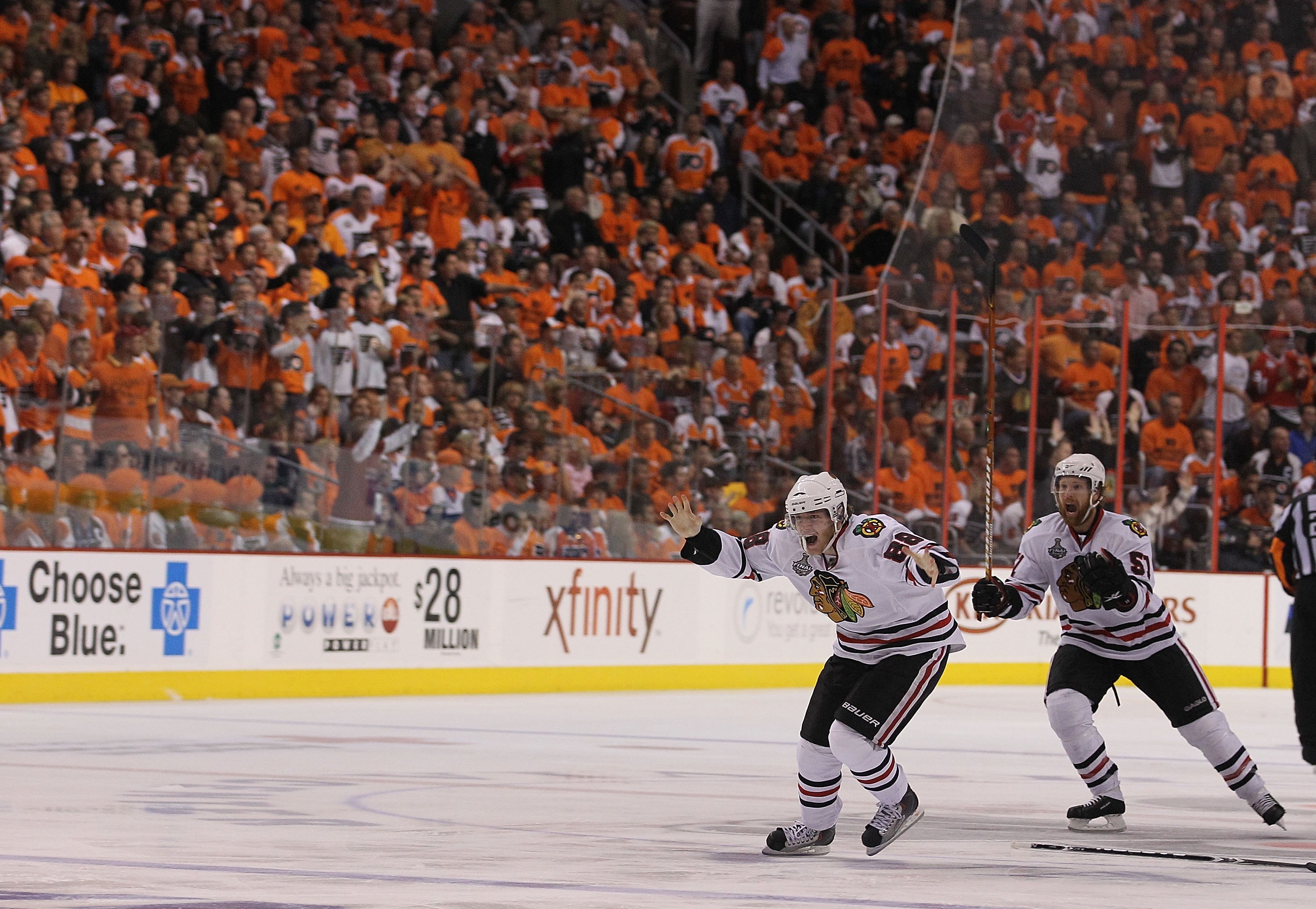 PHILADELPHIA - JUNE 09:  Patrick Kane #88 and Brian Campbell #52 of the Chicago Blackhawks celebrate after Kane's game winning goal in overtime as the Blackhawks defeated the Philadelphia Flyers 4-3 to win the Stanley Cup in Game Six of the 2010 NHL Stanl