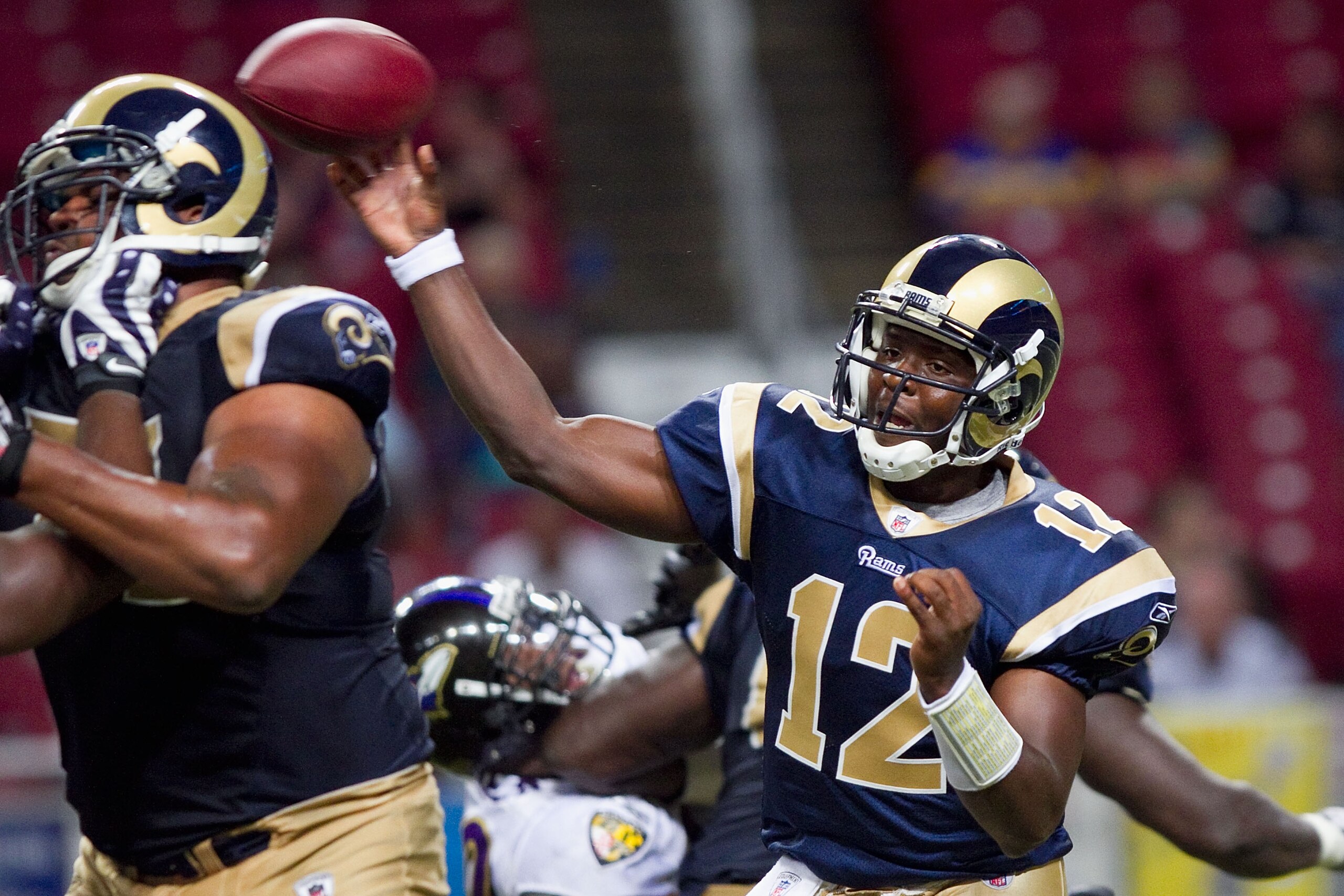 ST. LOUIS - SEPTEMBER 2: Thaddeus Lewis #12 of the St. Louis Rams passes against the Baltimore Ravens during an NFL preseason game at the Edward Jones Dome on September 2, 2010 in St. Louis, Missouri.  The Rams beat the Ravens 27-21.  (Photo by Dilip Vish