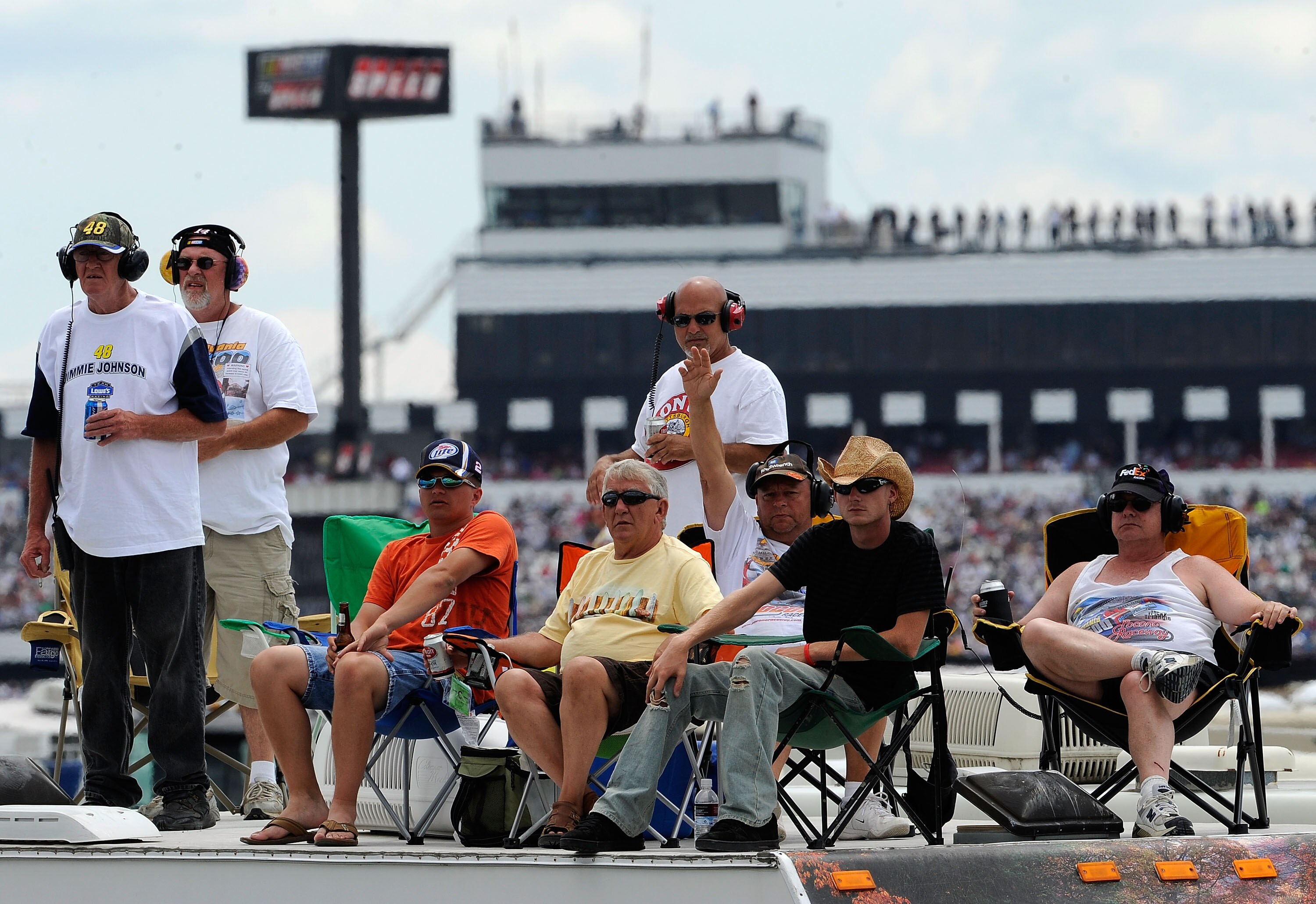 LONG POND, PA - JULY 31:  Fans watch the action from the infield of the NASCAR Camping World Truck Series Pocono Mountains 125 at Pocono Raceway on July 31, 2010 in Long Pond, Pennsylvania.  (Photo by Rusty Jarrett/Getty Images for NASCAR)