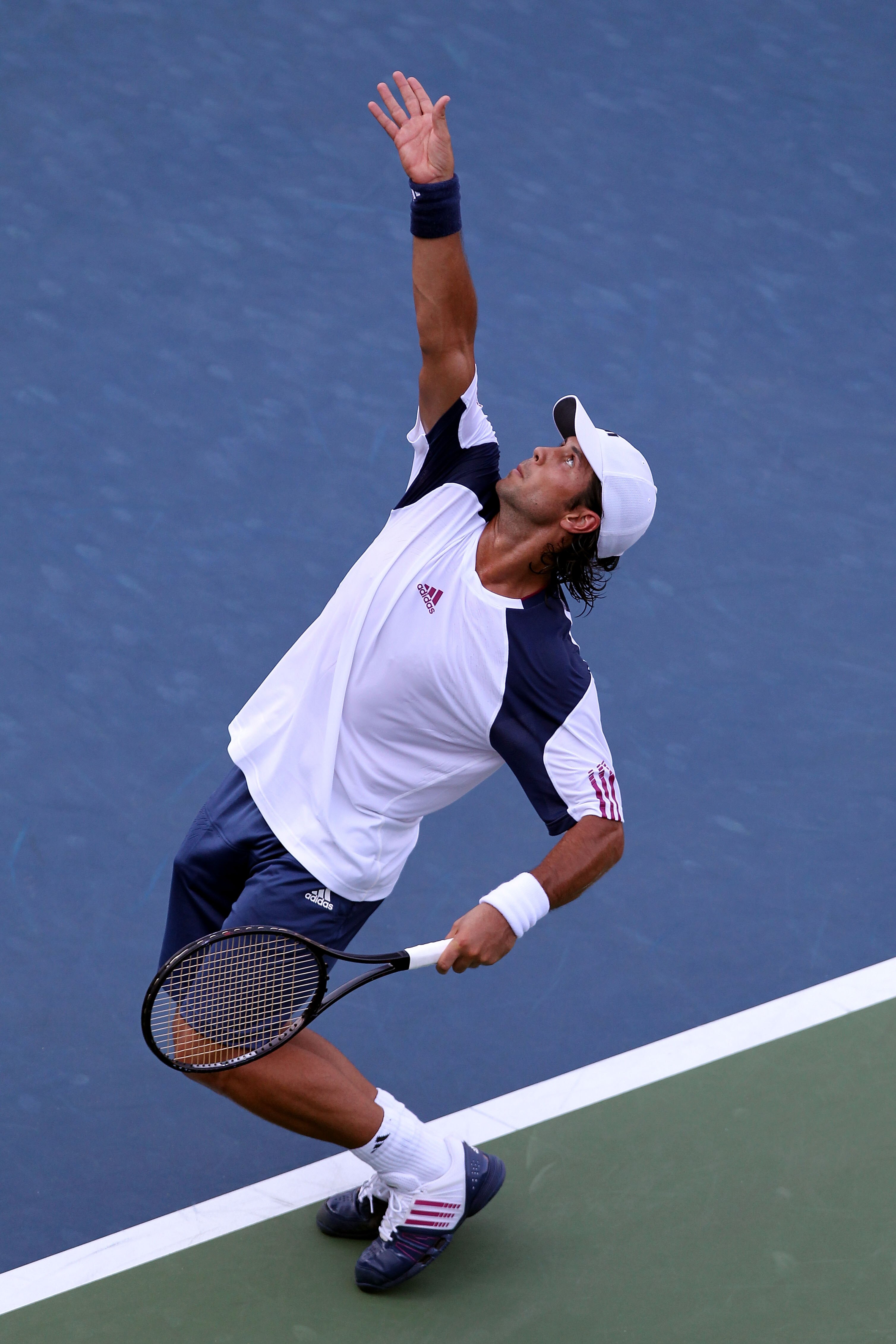 NEW YORK - AUGUST 31:  Fernando Verdasco of Spain serves against Fabio Fognini of Italy during his first round men's single's match on day two of the 2010 U.S. Open at the USTA Billie Jean King National Tennis Center on August 31, 2010 in the Flushing nei