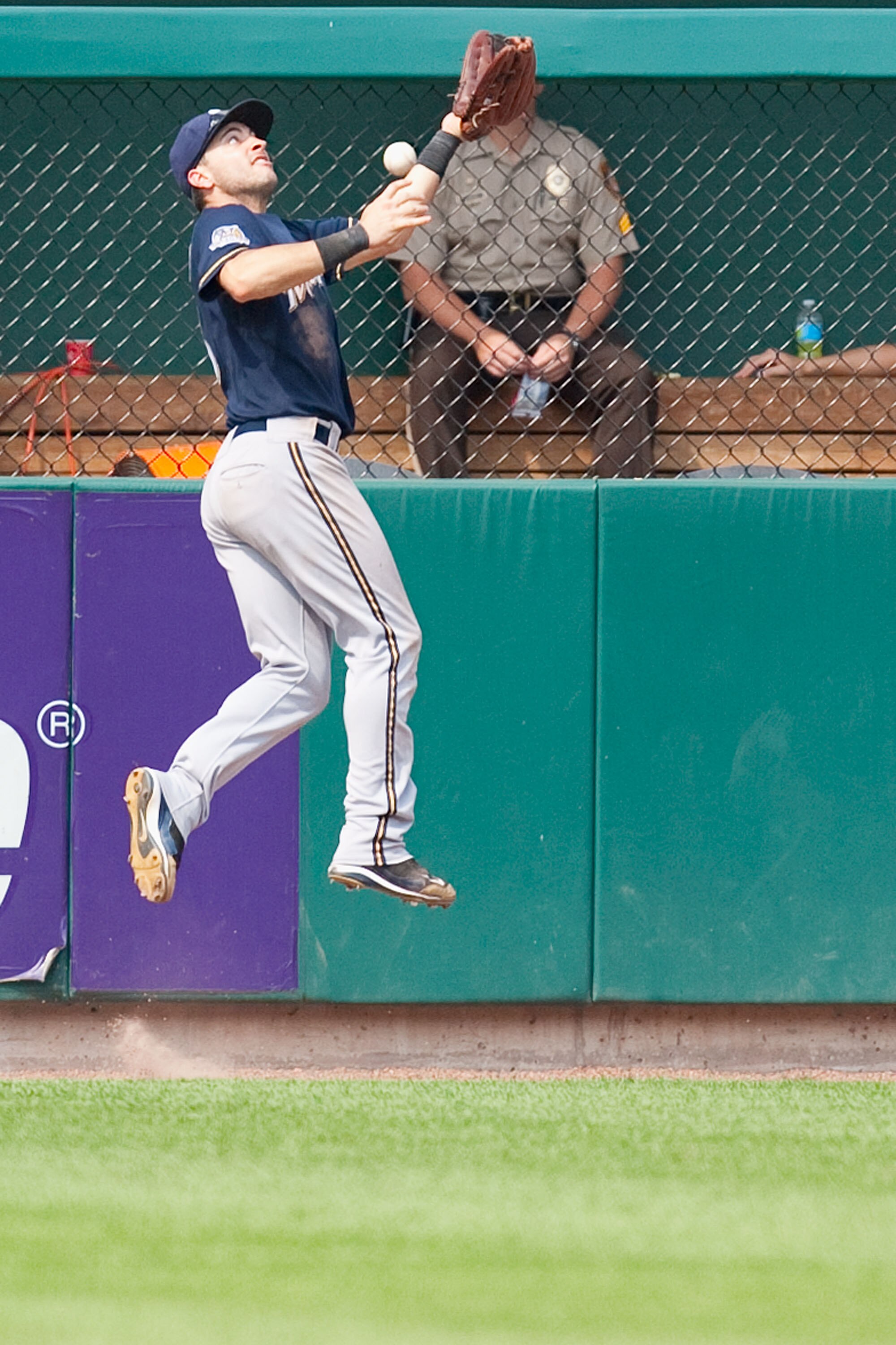 ST. LOUIS - AUGUST 18: Ryan Braun #8 of the Milwaukee Brewers attempts to catch a deep fly ball against the St. Louis Cardinals at Busch Stadium on August 18, 2010 in St. Louis, Missouri.  The Brewers beat the Cardinals 3-2.  (Photo by Dilip Vishwanat/Get