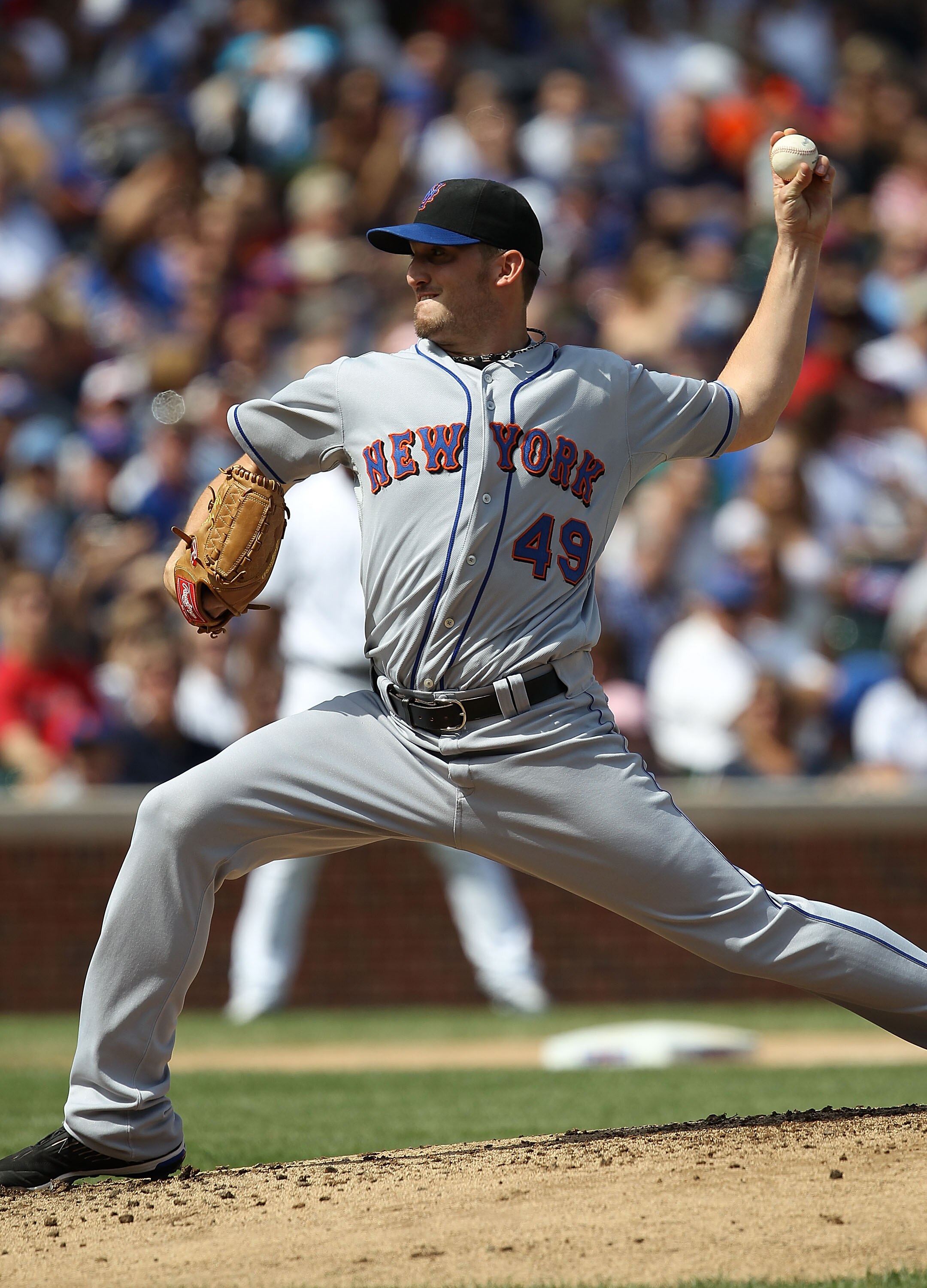 CHICAGO - SEPTEMBER 05: Starting pitcher Jonathan Niese #49 of the New York Mets delivers the ball against the Chicago Cubs at Wrigley Field on September 5, 2010 in Chicago, Illinois. (Photo by Jonathan Daniel/Getty Images)