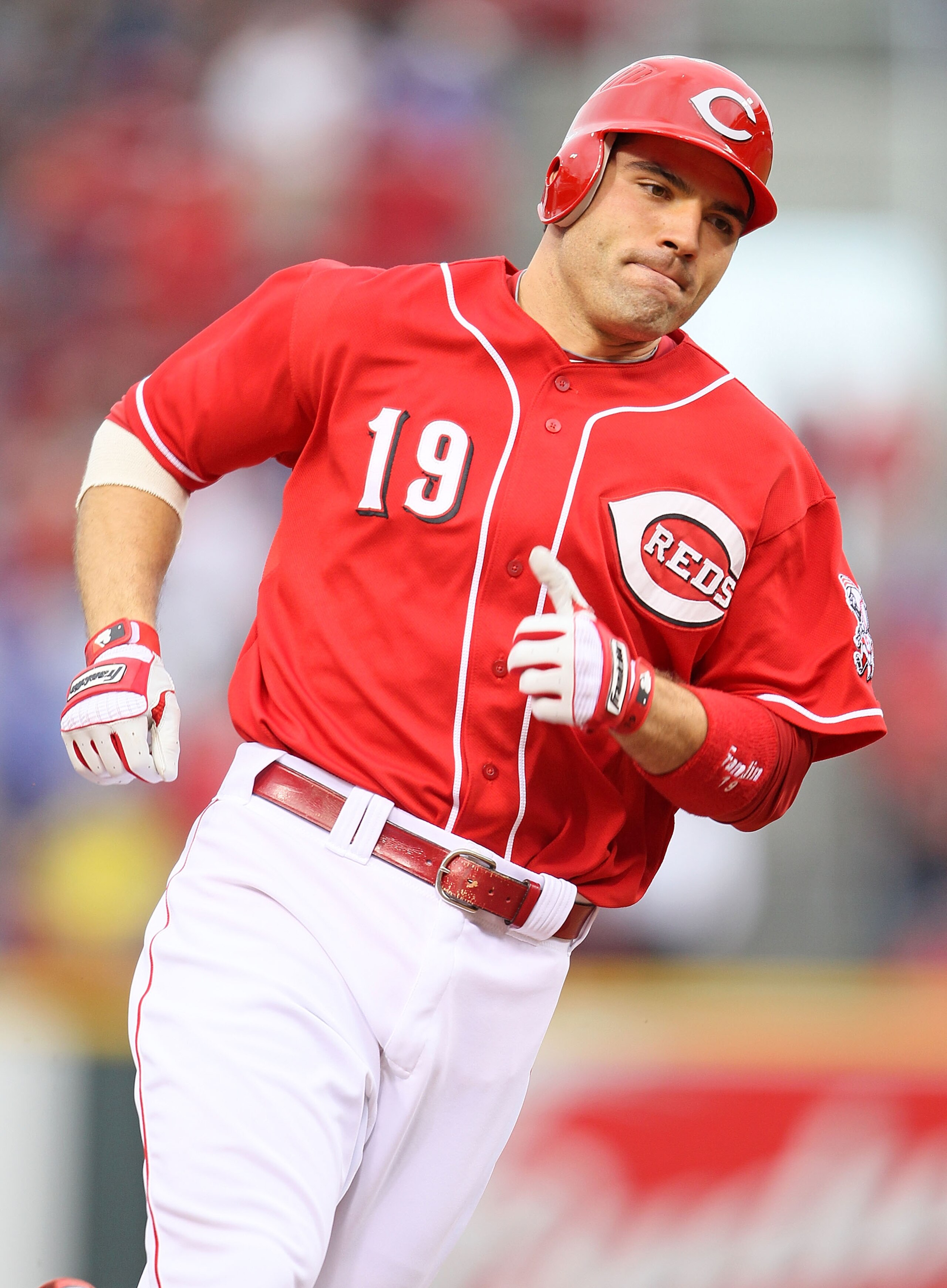 CINCINNATI - MAY 18:  Joey Votto #19 of the Cincinnati Reds runs the bases after he hit a home run in the 8th inning during the game against the Milwaukee Brewers at Great American Ball Park on May 18, 2010 in Cincinnati, Ohio. The Reds won 5-4.  (Photo b