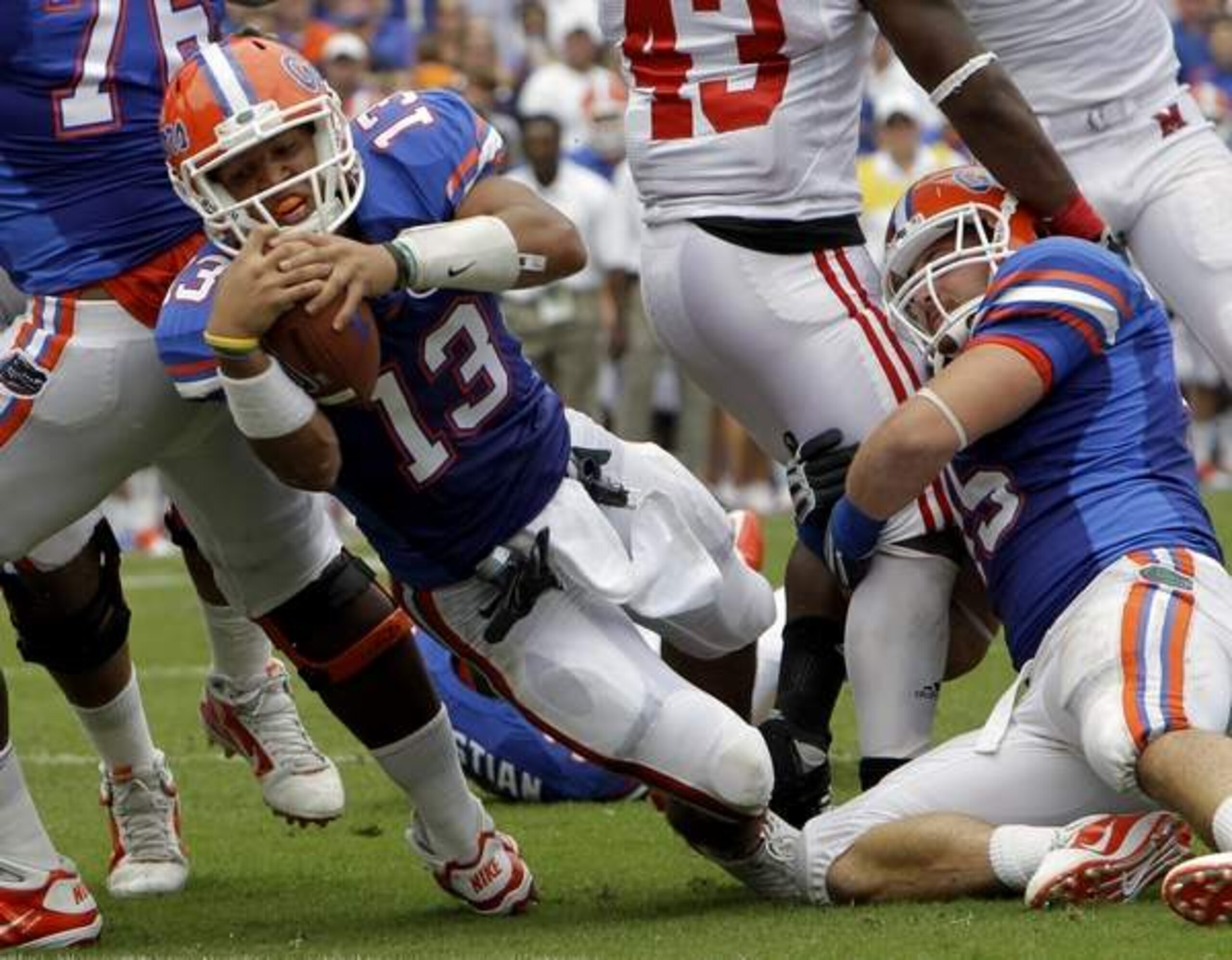 Backup quarterback Trey Burton bulldozes his way into the end zone for a two-yard touchdown run.