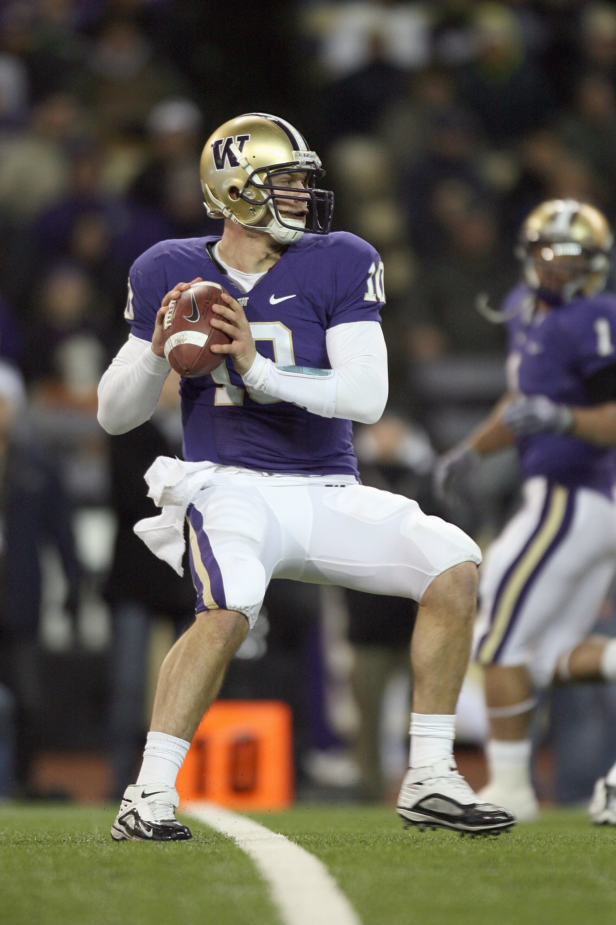 SEATTLE - DECEMBER 05:  Quarterback Jake Locker #10 of the Washington Huskies looks to pass the ball during game against the California Bears on December 5, 2009 at Husky Stadium in Seattle, Washington. The Huskies defeated the Bears 42-10. (Photo by Otto
