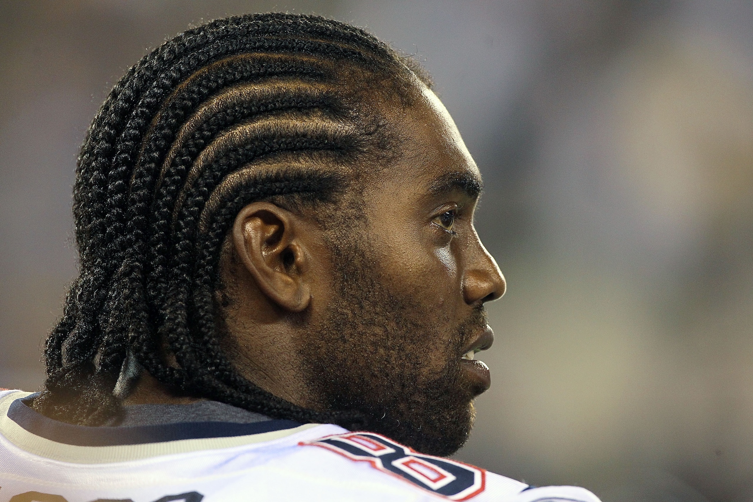 EAST RUTHERFORD, NJ - SEPTEMBER 02:  Randy Moss #81 of the New England Patriots looks on against the New York Giants on September 2, 2010 at the New Meadowlands Stadium in East Rutherford, New Jersey. The Giants defeated the Patriots 20-17.  (Photo by Jim