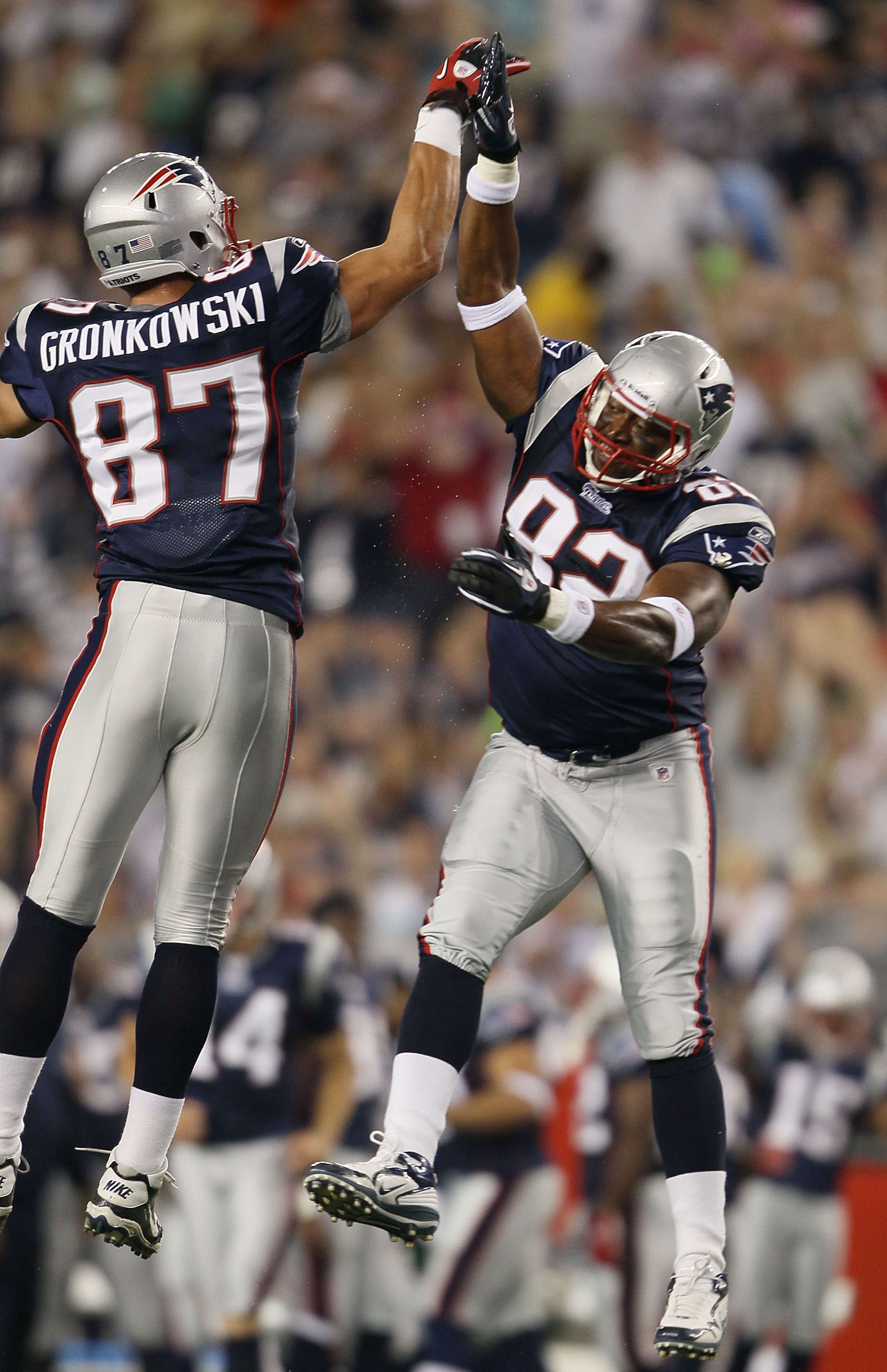 FOXBORO, MA - AUGUST 26:  Rob Gronkowski #87 of the New England Patriots celebrates his touchdown with teammate Marques Murrell #93 in the first half against the St. Louis Rams on August 26, 2010 at Gillette Stadium in Foxboro, Massachusetts.  (Photo by E