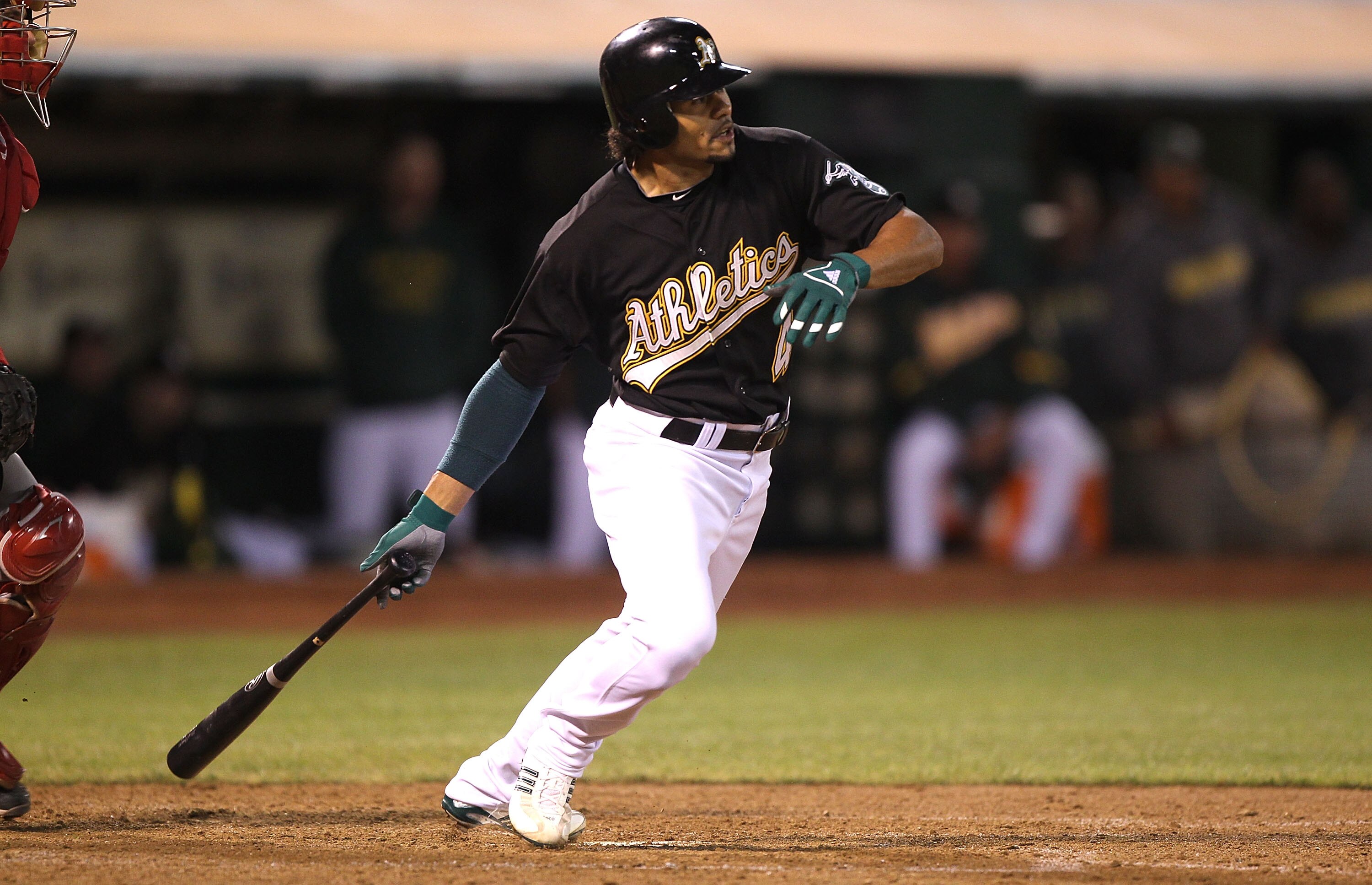 OAKLAND, CA - SEPTEMBER 03:  Coco Crisp #4 of the Oakland Athletics hits an RBI single in the sixth inning against the Los Angeles Angels of Anaheim during a Major League Baseball game at the Oakland-Alameda County Coliseum on September 3, 2010 in Oakland