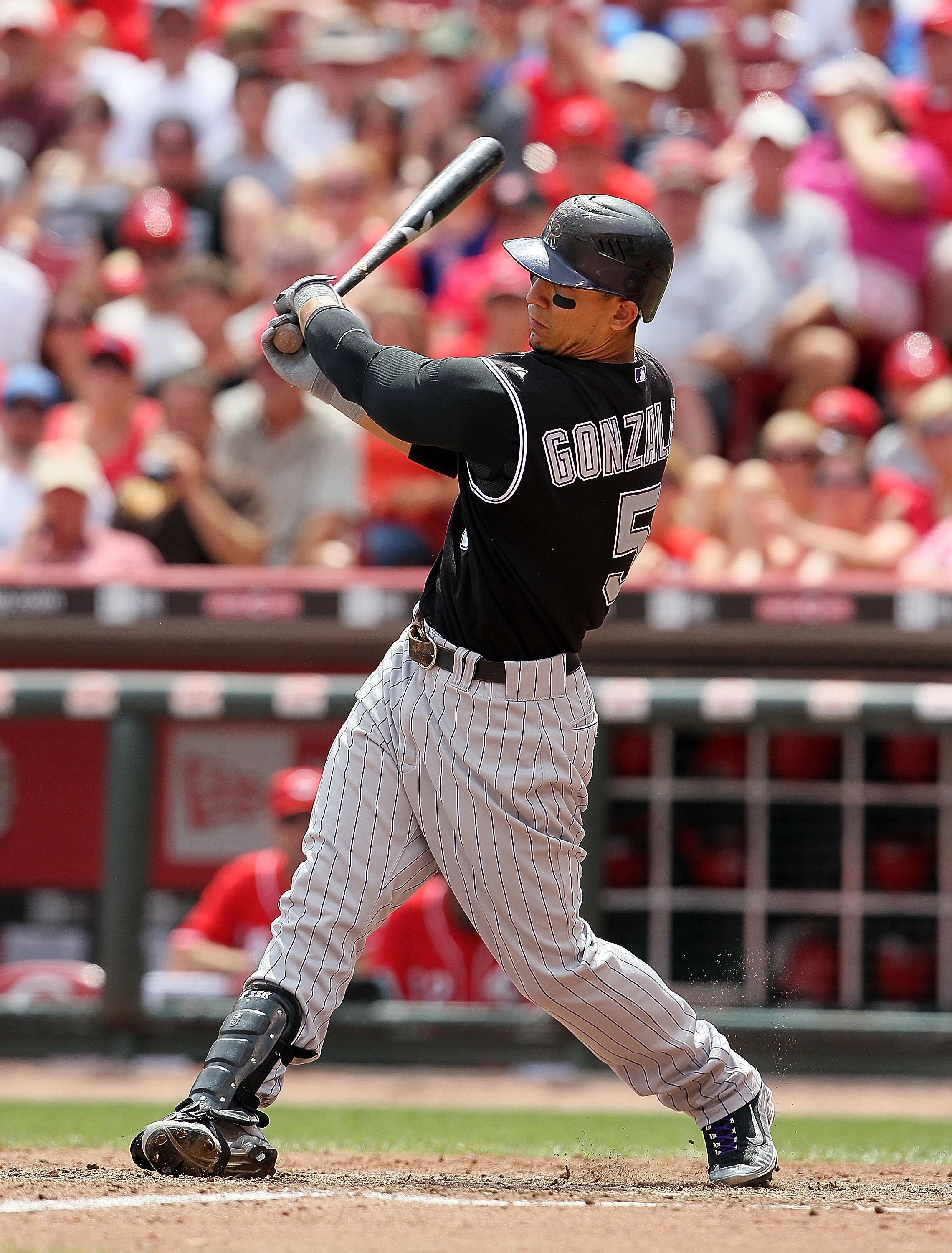 CINCINNATI - JULY 18: Carlos Gonzalez #5 of the Colorado Rockies is at bat during the game against the Cincinnati Reds at Great American Ball Park on July 18, 2010 in Cincinnati, Ohio.  (Photo by Andy Lyons/Getty Images)