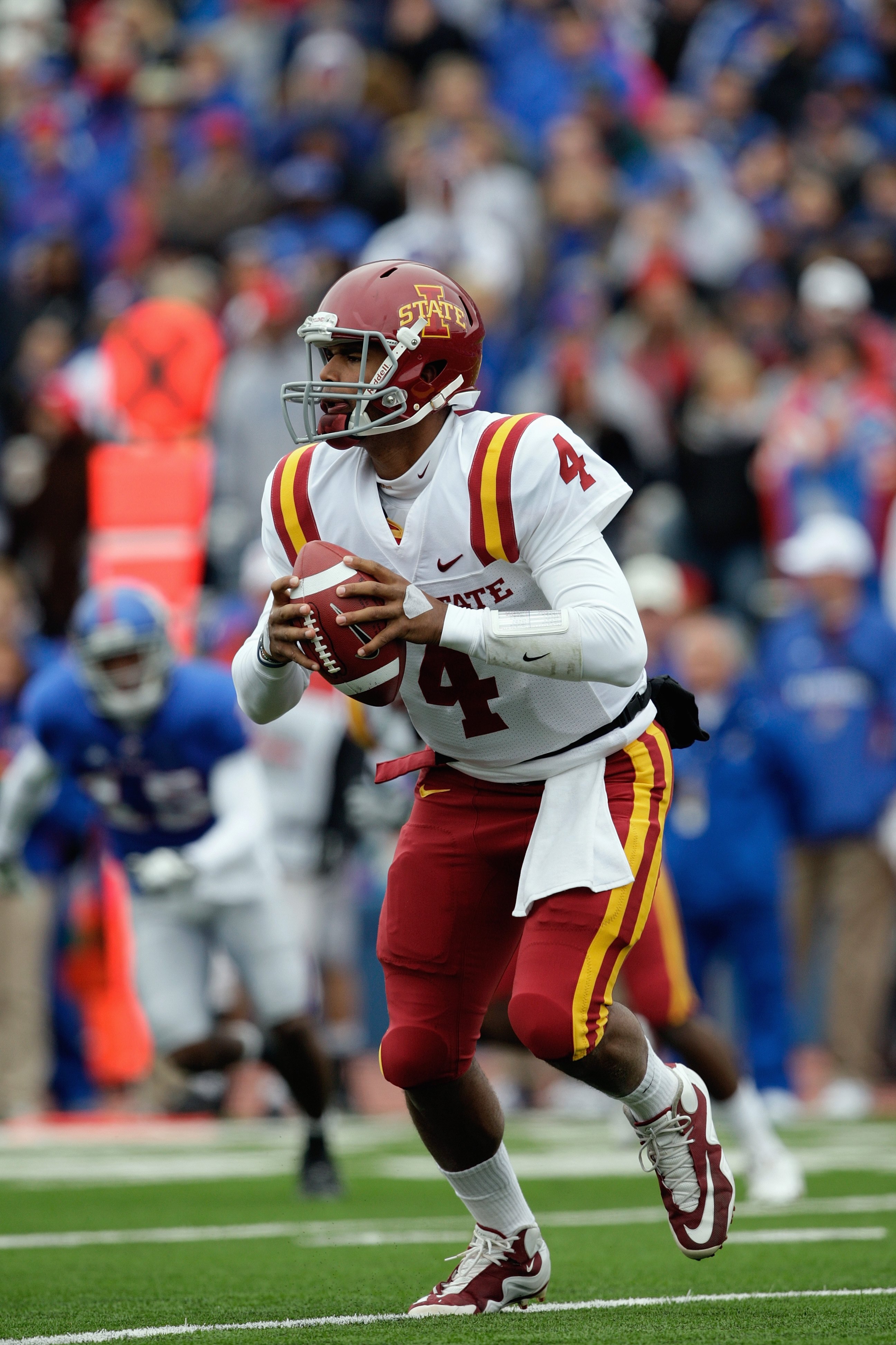 LAWRENCE, KS - OCTOBER 10:  Austen Arnaud #4 of the Iowa State Cyclones runs with the ball during the game against the Kansas Jayhawks on October 10, 2009 at Memorial Stadium in Lawrence, Kansas. (Photo by Jamie Squire/Getty Images)